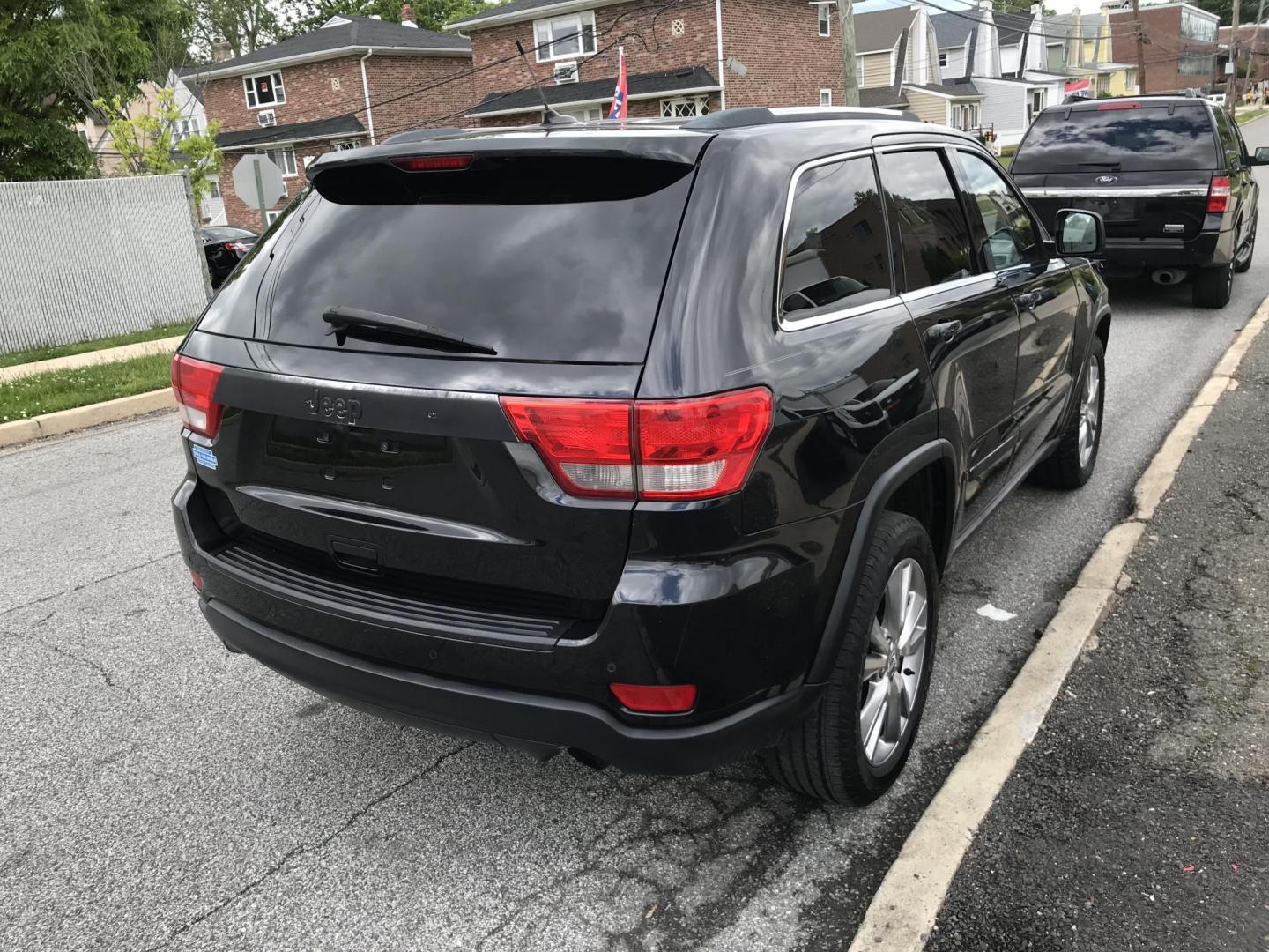 2013 Black /Black Jeep Grand Cherokee Laredo 4WD (1C4RJFAG4DC) with an 3.6L V6 DOHC 24V engine, 5-Speed Automatic transmission, located at 577 Chester Pike, Prospect Park, PA, 19076, (610) 237-1015, 39.886154, -75.302338 - 2013 Jeep Grand Cherokee Laredo: Backup camera, sunroof, new PA inspection, SUPER CLEAN, runs LIKE NEW! This vehicle comes inspected and has been given a bumper to bumper safety check. It is very clean, reliable, and well maintained. We offer a unique pay plan that is known for being the easiest - Photo#4