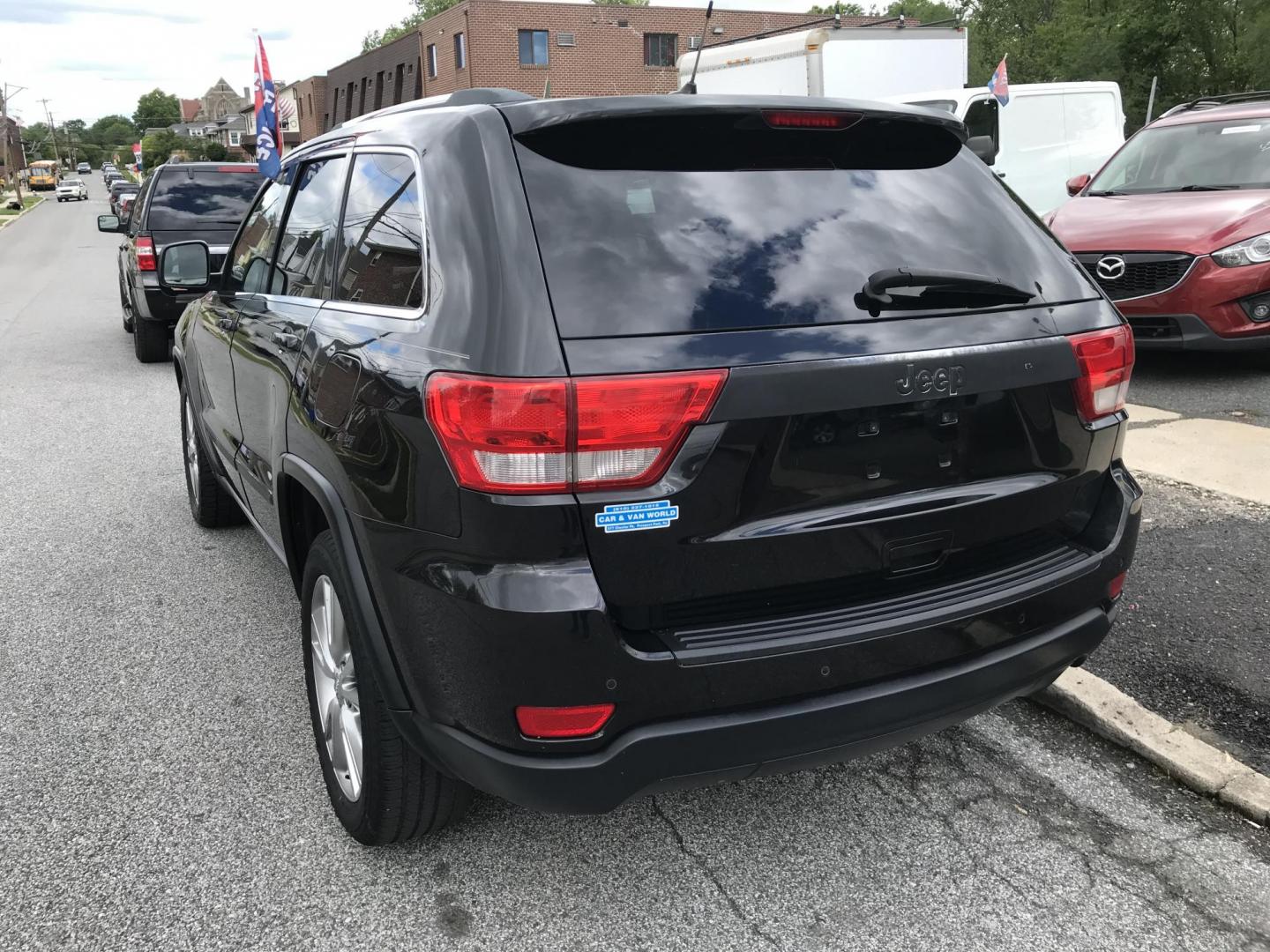 2013 Black /Black Jeep Grand Cherokee Laredo 4WD (1C4RJFAG4DC) with an 3.6L V6 DOHC 24V engine, 5-Speed Automatic transmission, located at 577 Chester Pike, Prospect Park, PA, 19076, (610) 237-1015, 39.886154, -75.302338 - 2013 Jeep Grand Cherokee Laredo: Backup camera, sunroof, new PA inspection, SUPER CLEAN, runs LIKE NEW! This vehicle comes inspected and has been given a bumper to bumper safety check. It is very clean, reliable, and well maintained. We offer a unique pay plan that is known for being the easiest - Photo#5