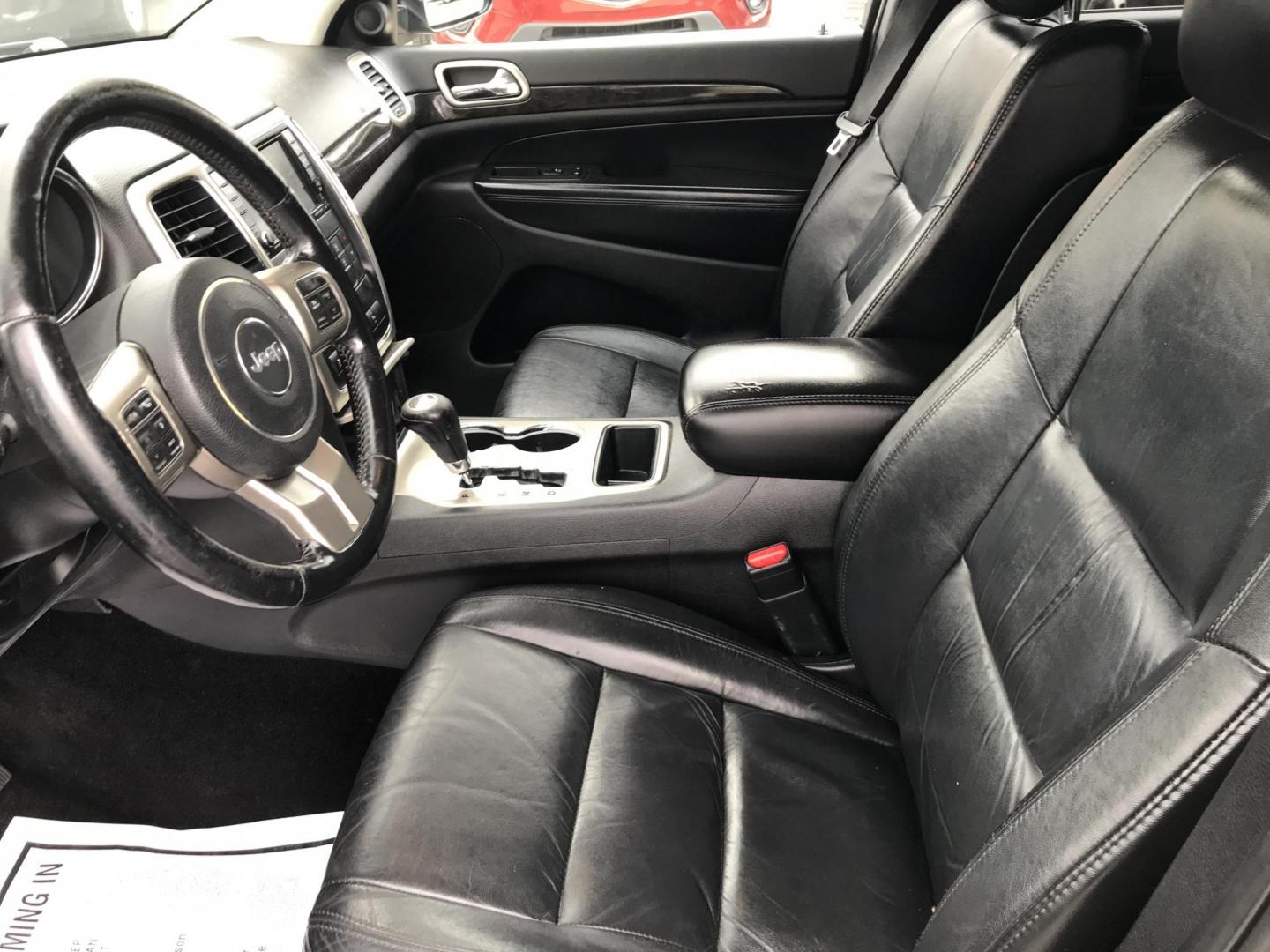 2013 Black /Black Jeep Grand Cherokee Laredo 4WD (1C4RJFAG4DC) with an 3.6L V6 DOHC 24V engine, 5-Speed Automatic transmission, located at 577 Chester Pike, Prospect Park, PA, 19076, (610) 237-1015, 39.886154, -75.302338 - 2013 Jeep Grand Cherokee Laredo: Backup camera, sunroof, new PA inspection, SUPER CLEAN, runs LIKE NEW! This vehicle comes inspected and has been given a bumper to bumper safety check. It is very clean, reliable, and well maintained. We offer a unique pay plan that is known for being the easiest - Photo#9