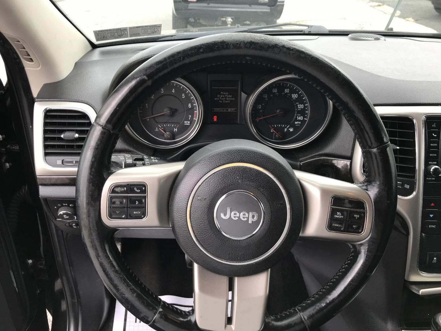 2013 Black /Black Jeep Grand Cherokee Laredo 4WD (1C4RJFAG4DC) with an 3.6L V6 DOHC 24V engine, 5-Speed Automatic transmission, located at 577 Chester Pike, Prospect Park, PA, 19076, (610) 237-1015, 39.886154, -75.302338 - 2013 Jeep Grand Cherokee Laredo: Backup camera, sunroof, new PA inspection, SUPER CLEAN, runs LIKE NEW! This vehicle comes inspected and has been given a bumper to bumper safety check. It is very clean, reliable, and well maintained. We offer a unique pay plan that is known for being the easiest - Photo#10