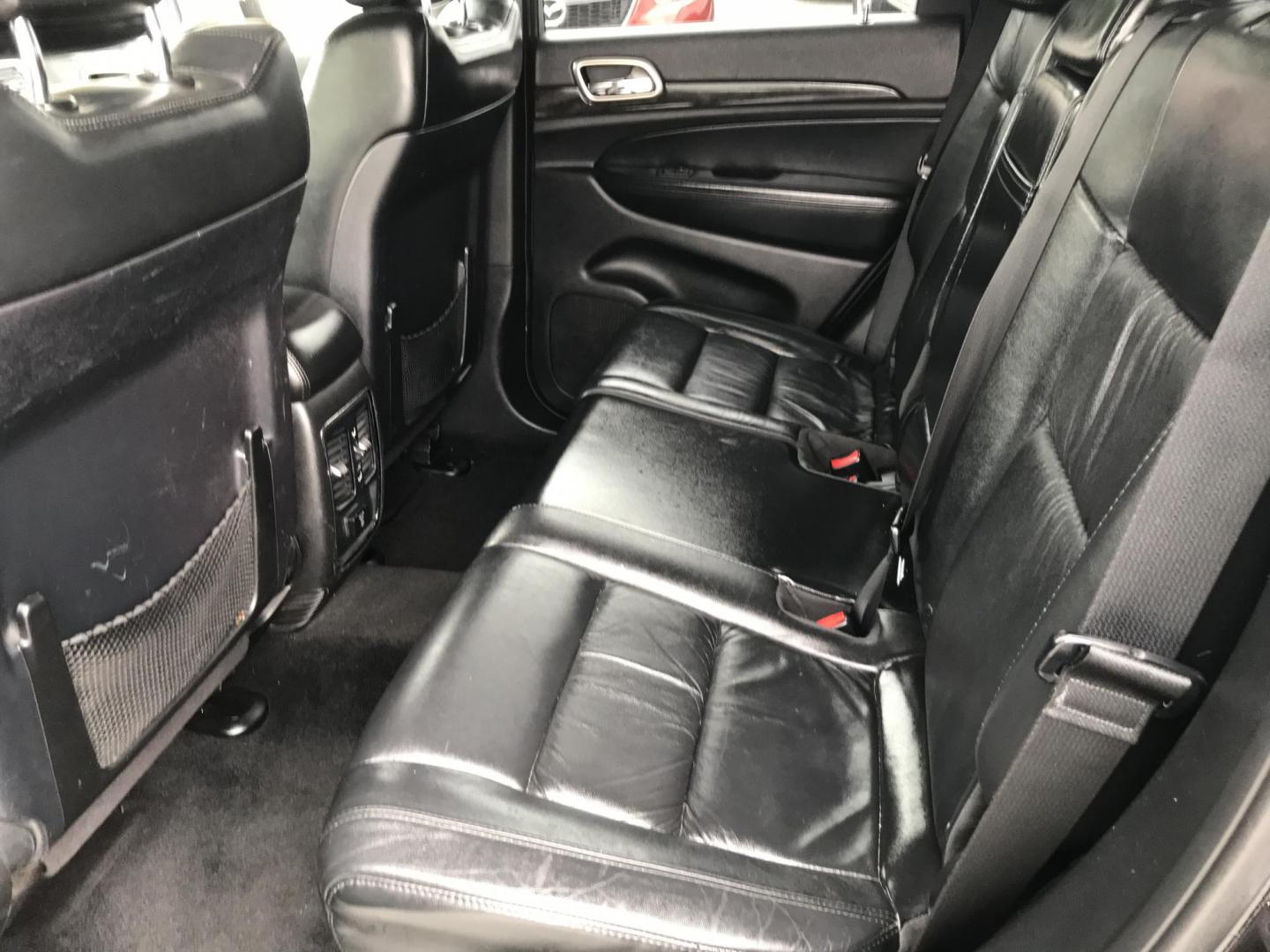 2013 Black /Black Jeep Grand Cherokee Laredo 4WD (1C4RJFAG4DC) with an 3.6L V6 DOHC 24V engine, 5-Speed Automatic transmission, located at 577 Chester Pike, Prospect Park, PA, 19076, (610) 237-1015, 39.886154, -75.302338 - 2013 Jeep Grand Cherokee Laredo: Backup camera, sunroof, new PA inspection, SUPER CLEAN, runs LIKE NEW! This vehicle comes inspected and has been given a bumper to bumper safety check. It is very clean, reliable, and well maintained. We offer a unique pay plan that is known for being the easiest - Photo#14