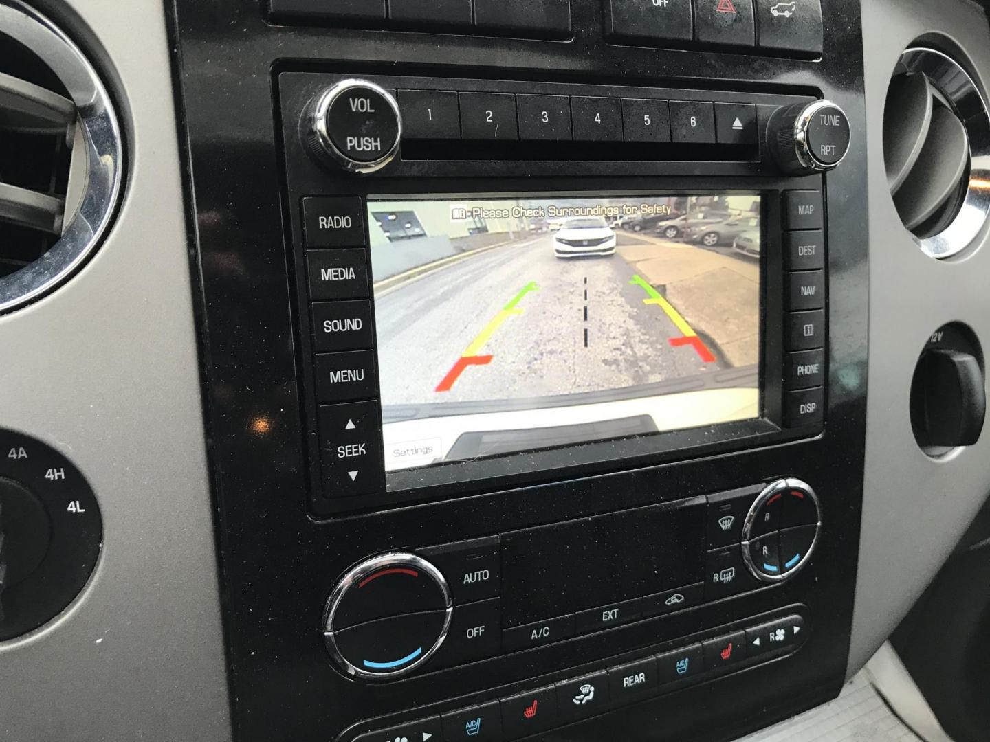 2014 White /Black Ford Expedition Limited 4WD (1FMJU2A56EE) with an 5.4L V8 SOHC 16V FFV engine, 6-Speed Automatic transmission, located at 577 Chester Pike, Prospect Park, PA, 19076, (610) 237-1015, 39.886154, -75.302338 - 2014 Ford Expedition LIMITED: 3rd row seating, 4x4, sunroof, DVD player in headrests, backup camera, navigation system, runs LIKE NEW! This vehicle comes inspected and has been given a bumper to bumper safety check. It is very clean, reliable, and well maintained. We offer a unique pay plan that - Photo#16