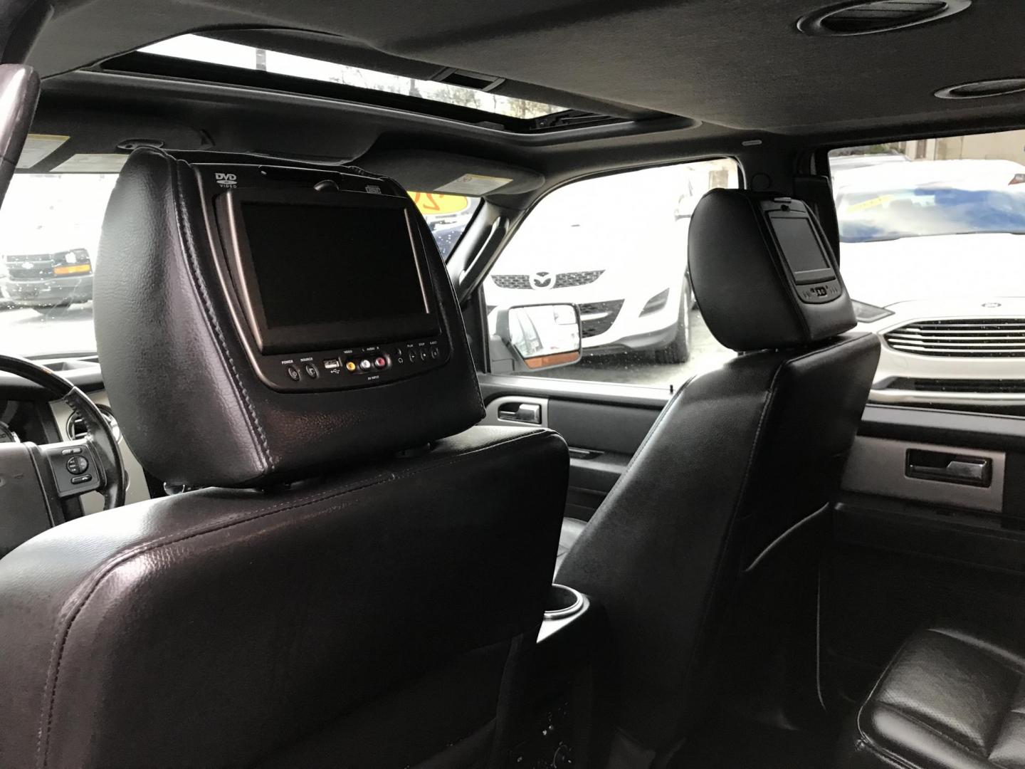 2014 White /Black Ford Expedition Limited 4WD (1FMJU2A56EE) with an 5.4L V8 SOHC 16V FFV engine, 6-Speed Automatic transmission, located at 577 Chester Pike, Prospect Park, PA, 19076, (610) 237-1015, 39.886154, -75.302338 - 2014 Ford Expedition LIMITED: 3rd row seating, 4x4, sunroof, DVD player in headrests, backup camera, navigation system, runs LIKE NEW! This vehicle comes inspected and has been given a bumper to bumper safety check. It is very clean, reliable, and well maintained. We offer a unique pay plan that - Photo#22