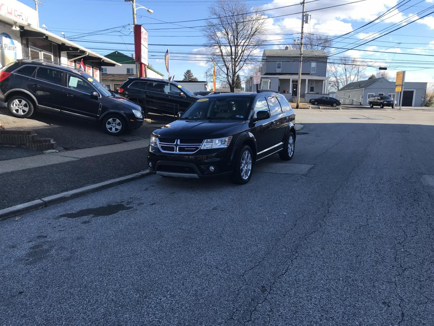 2015 Black /Tan Dodge Journey SXT (3C4PDCBG2FT) with an 3.6L V6 DOHC 24V engine, 6-Speed Automatic transmission, located at 577 Chester Pike, Prospect Park, PA, 19076, (610) 237-1015, 39.886154, -75.302338 - 2015 Dodge Journey SXT: 3rd row seating, new PA inspection, SUPER CLEAN, runs LIKE NEW! This vehicle comes inspected and has been given a bumper to bumper safety check. It is very clean, reliable, and well maintained. We offer a unique pay plan that is known for being the easiest and fastest fina - Photo#1