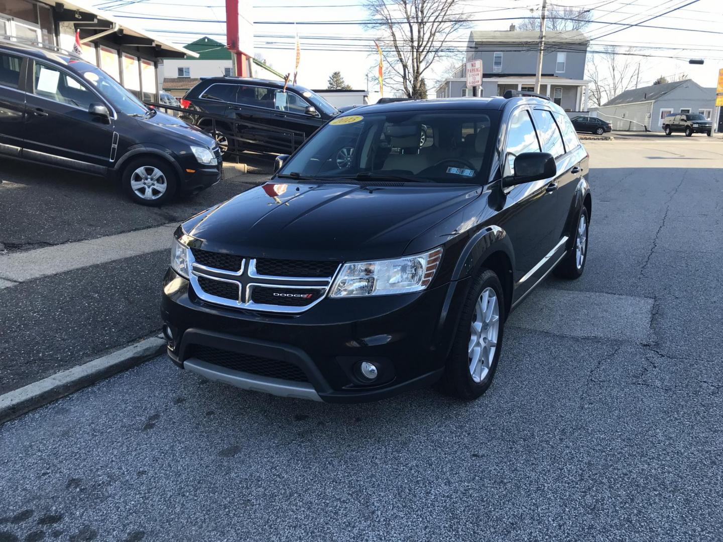 2015 Black /Tan Dodge Journey SXT (3C4PDCBG2FT) with an 3.6L V6 DOHC 24V engine, 6-Speed Automatic transmission, located at 577 Chester Pike, Prospect Park, PA, 19076, (610) 237-1015, 39.886154, -75.302338 - 2015 Dodge Journey SXT: 3rd row seating, new PA inspection, SUPER CLEAN, runs LIKE NEW! This vehicle comes inspected and has been given a bumper to bumper safety check. It is very clean, reliable, and well maintained. We offer a unique pay plan that is known for being the easiest and fastest fina - Photo#2