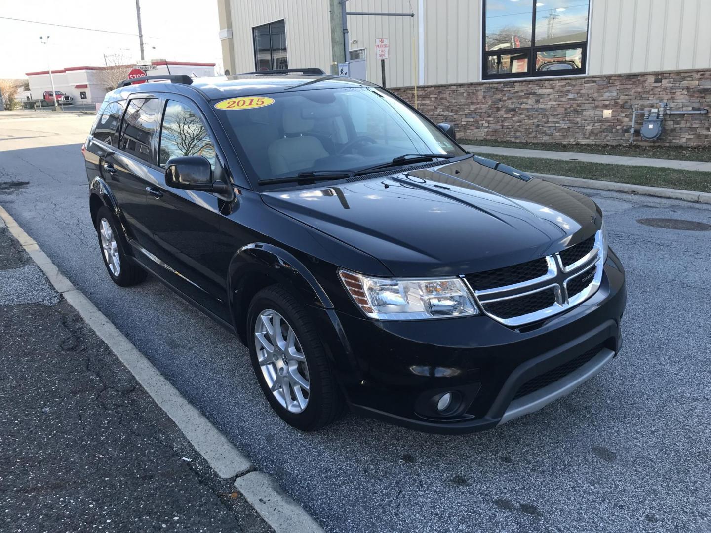 2015 Black /Tan Dodge Journey SXT (3C4PDCBG2FT) with an 3.6L V6 DOHC 24V engine, 6-Speed Automatic transmission, located at 577 Chester Pike, Prospect Park, PA, 19076, (610) 237-1015, 39.886154, -75.302338 - 2015 Dodge Journey SXT: 3rd row seating, new PA inspection, SUPER CLEAN, runs LIKE NEW! This vehicle comes inspected and has been given a bumper to bumper safety check. It is very clean, reliable, and well maintained. We offer a unique pay plan that is known for being the easiest and fastest fina - Photo#3