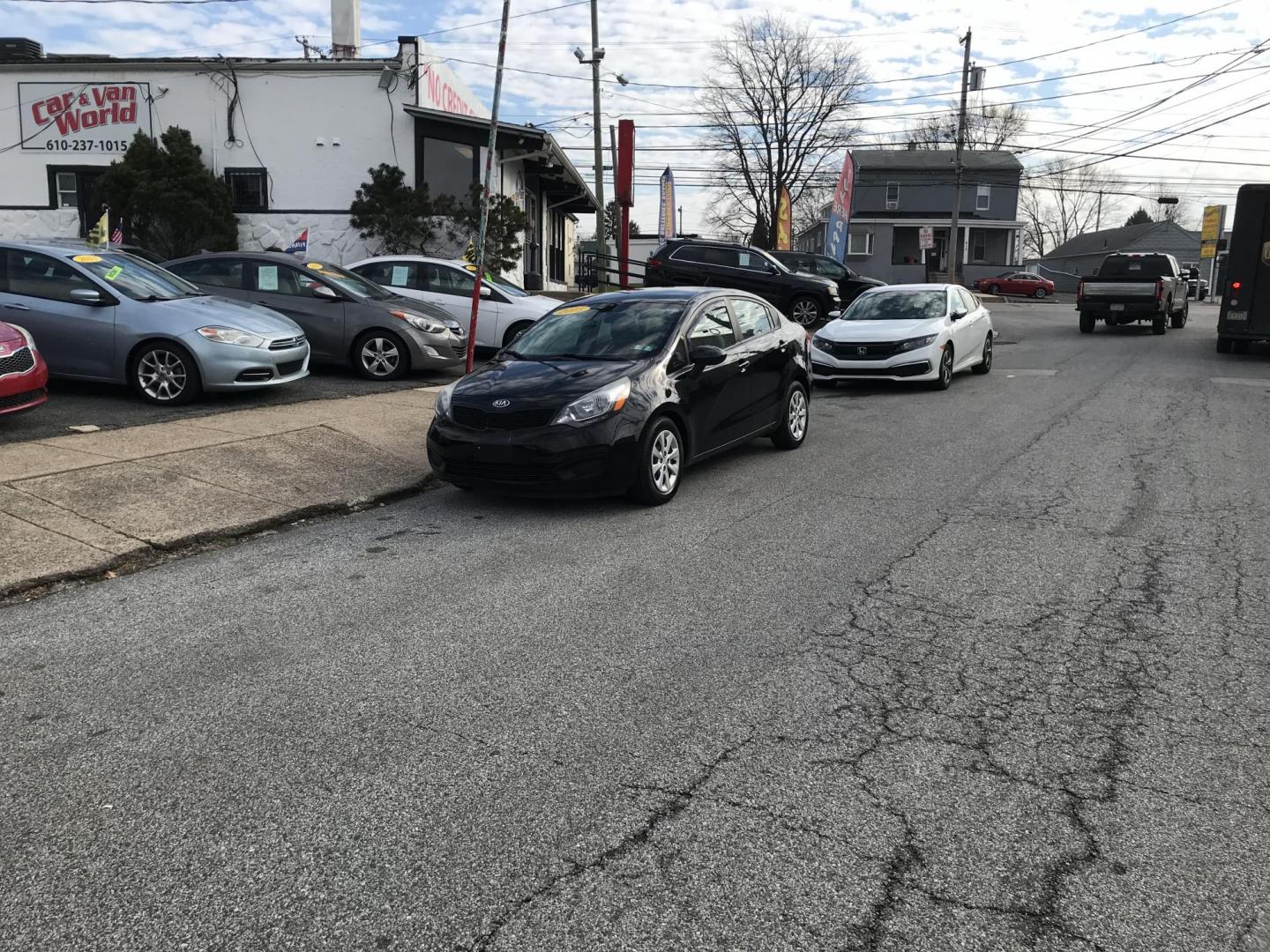 2015 Black /Tan Kia Rio LX (KNADM4A35F6) with an 1.6L L4 DOHC 16V engine, Automatic transmission, located at 577 Chester Pike, Prospect Park, PA, 19076, (610) 237-1015, 39.886154, -75.302338 - 2015 Kia Rio LX: Only 104k miles, great on gas, new PA inspection, SUPER CLEAN, runs LIKE NEW! This vehicle comes inspected and has been given a bumper to bumper safety check. It is very clean, reliable, and well maintained. We offer a unique pay plan that is known for being the easiest and faste - Photo#1