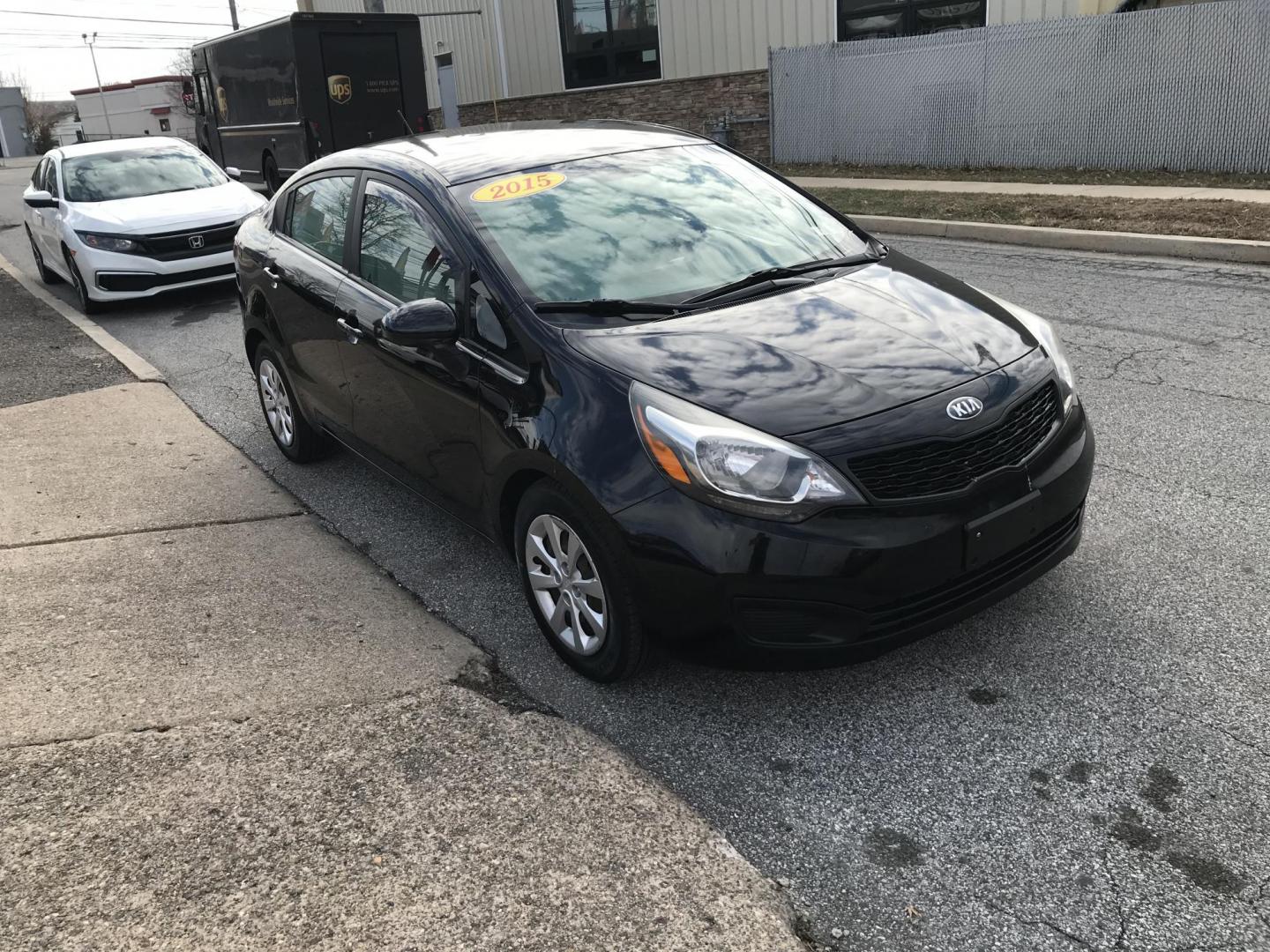 2015 Black /Tan Kia Rio LX (KNADM4A35F6) with an 1.6L L4 DOHC 16V engine, Automatic transmission, located at 577 Chester Pike, Prospect Park, PA, 19076, (610) 237-1015, 39.886154, -75.302338 - 2015 Kia Rio LX: Only 104k miles, great on gas, new PA inspection, SUPER CLEAN, runs LIKE NEW! This vehicle comes inspected and has been given a bumper to bumper safety check. It is very clean, reliable, and well maintained. We offer a unique pay plan that is known for being the easiest and faste - Photo#3