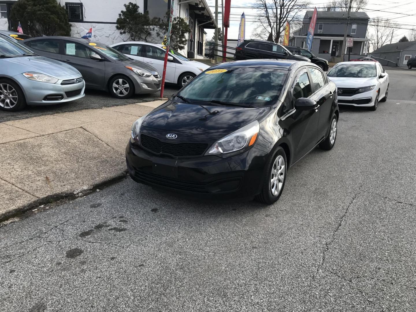 2015 Black /Tan Kia Rio LX (KNADM4A35F6) with an 1.6L L4 DOHC 16V engine, Automatic transmission, located at 577 Chester Pike, Prospect Park, PA, 19076, (610) 237-1015, 39.886154, -75.302338 - 2015 Kia Rio LX: Only 104k miles, great on gas, new PA inspection, SUPER CLEAN, runs LIKE NEW! This vehicle comes inspected and has been given a bumper to bumper safety check. It is very clean, reliable, and well maintained. We offer a unique pay plan that is known for being the easiest and faste - Photo#2