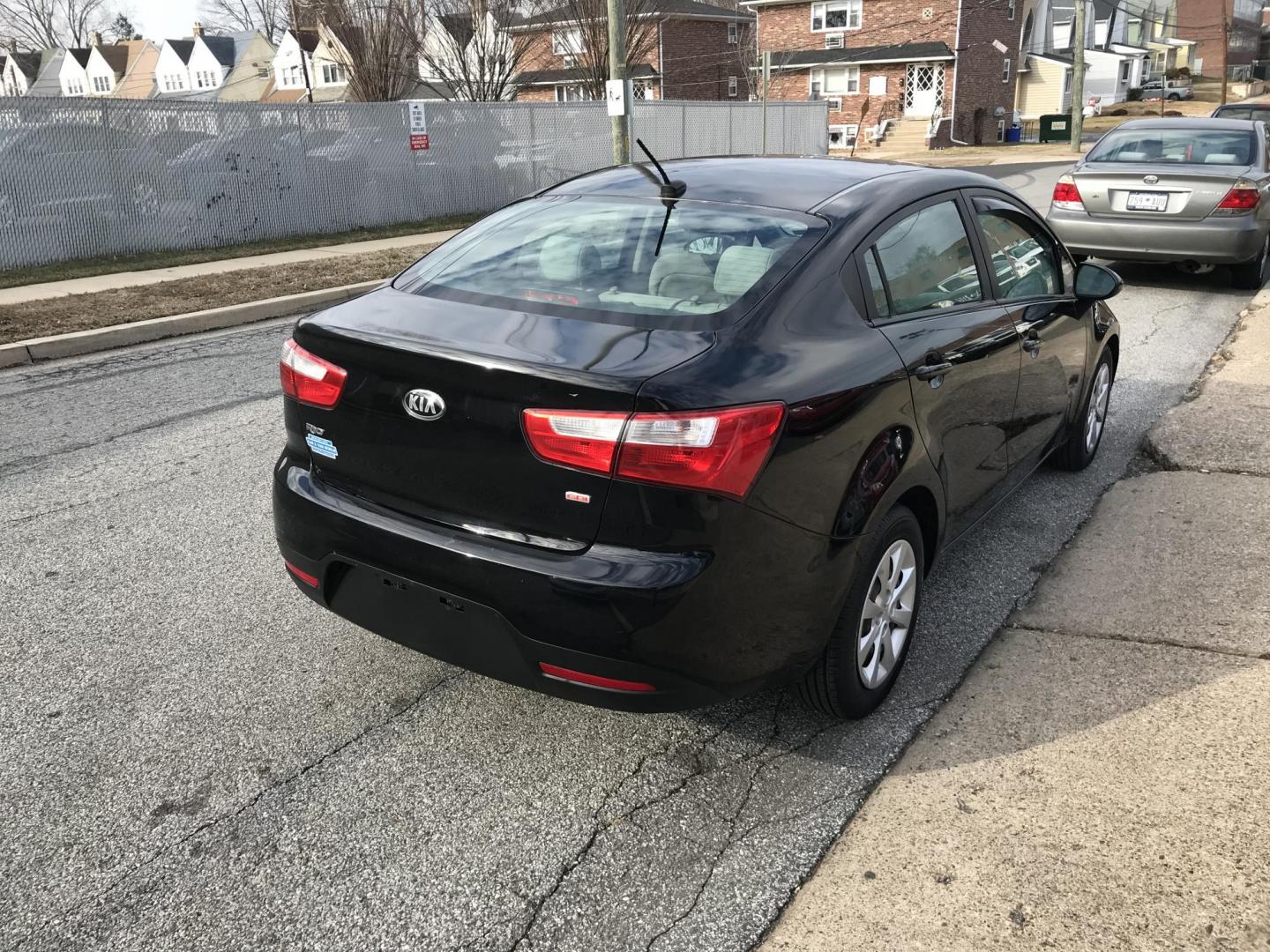 2015 Black /Tan Kia Rio LX (KNADM4A35F6) with an 1.6L L4 DOHC 16V engine, Automatic transmission, located at 577 Chester Pike, Prospect Park, PA, 19076, (610) 237-1015, 39.886154, -75.302338 - 2015 Kia Rio LX: Only 104k miles, great on gas, new PA inspection, SUPER CLEAN, runs LIKE NEW! This vehicle comes inspected and has been given a bumper to bumper safety check. It is very clean, reliable, and well maintained. We offer a unique pay plan that is known for being the easiest and faste - Photo#4