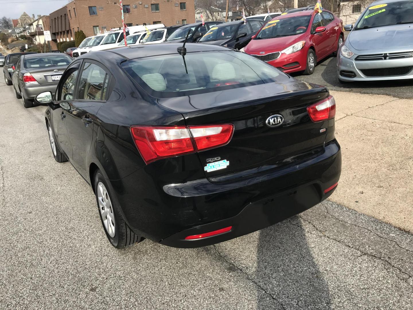 2015 Black /Tan Kia Rio LX (KNADM4A35F6) with an 1.6L L4 DOHC 16V engine, Automatic transmission, located at 577 Chester Pike, Prospect Park, PA, 19076, (610) 237-1015, 39.886154, -75.302338 - 2015 Kia Rio LX: Only 104k miles, great on gas, new PA inspection, SUPER CLEAN, runs LIKE NEW! This vehicle comes inspected and has been given a bumper to bumper safety check. It is very clean, reliable, and well maintained. We offer a unique pay plan that is known for being the easiest and faste - Photo#5