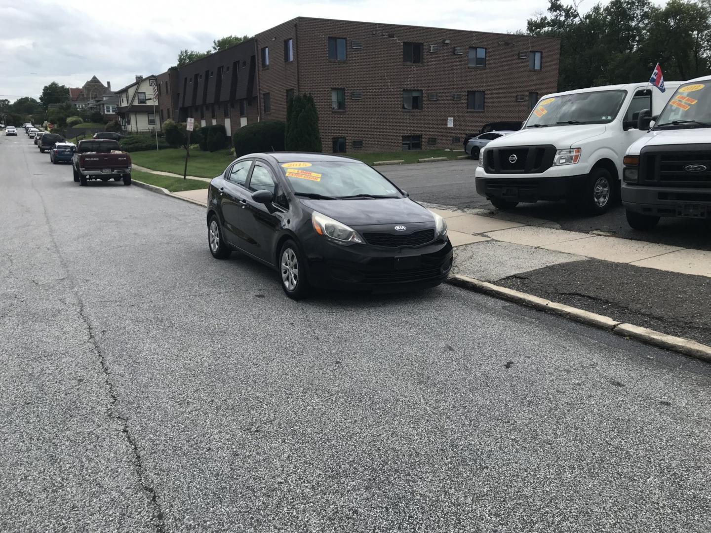 2015 Black /Tan Kia Rio LX (KNADM4A35F6) with an 1.6L L4 DOHC 16V engine, Automatic transmission, located at 577 Chester Pike, Prospect Park, PA, 19076, (610) 237-1015, 39.886154, -75.302338 - 2015 Kia Rio LX: Only 108k miles, great on gas, new PA inspection, SUPER CLEAN, runs LIKE NEW! This vehicle comes inspected and has been given a bumper to bumper safety check. It is very clean, reliable, and well maintained. We offer a unique pay plan that is known for being the easiest and faste- Photo#1