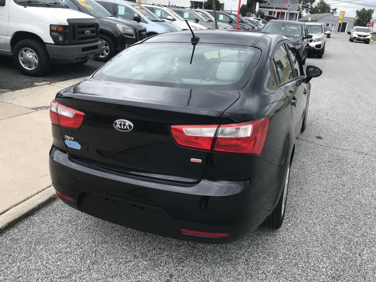 2015 Black /Tan Kia Rio LX (KNADM4A35F6) with an 1.6L L4 DOHC 16V engine, Automatic transmission, located at 577 Chester Pike, Prospect Park, PA, 19076, (610) 237-1015, 39.886154, -75.302338 - 2015 Kia Rio LX: Only 108k miles, great on gas, new PA inspection, SUPER CLEAN, runs LIKE NEW! This vehicle comes inspected and has been given a bumper to bumper safety check. It is very clean, reliable, and well maintained. We offer a unique pay plan that is known for being the easiest and faste- Photo#6