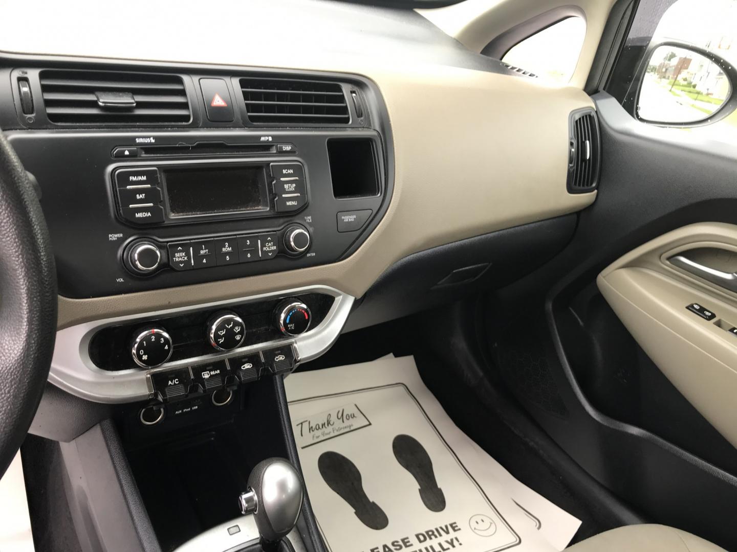 2015 Black /Tan Kia Rio LX (KNADM4A35F6) with an 1.6L L4 DOHC 16V engine, Automatic transmission, located at 577 Chester Pike, Prospect Park, PA, 19076, (610) 237-1015, 39.886154, -75.302338 - 2015 Kia Rio LX: Only 108k miles, great on gas, new PA inspection, SUPER CLEAN, runs LIKE NEW! This vehicle comes inspected and has been given a bumper to bumper safety check. It is very clean, reliable, and well maintained. We offer a unique pay plan that is known for being the easiest and faste- Photo#12