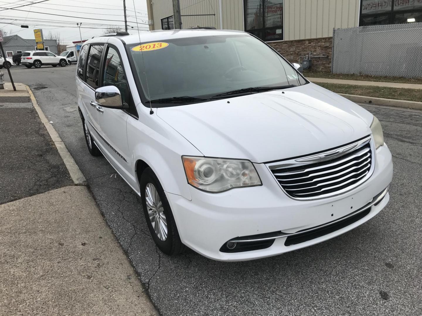 2013 White /Tan Chrysler Town & Country Limited (2C4RC1GG0DR) with an 3.6L V6 DOHC 24V engine, 6-Speed Automatic transmission, located at 577 Chester Pike, Prospect Park, PA, 19076, (610) 237-1015, 39.886154, -75.302338 - 2013 Chrysler Town & Country LIMITED: Only 93k miles, stow n' go seating, DVD player, backup camera, SUPER CLEAN, runs LIKE NEW! This vehicle comes inspected and has been given a bumper to bumper safety check. It is very clean, reliable, and well maintained. We offer a unique pay plan that is kno - Photo#6