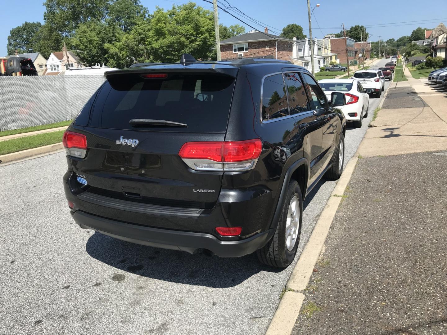 2014 Black /Black Jeep Grand Cherokee Laredo 4WD (1C4RJFAG7EC) with an 3.6L V6 DOHC 24V engine, 5-Speed Automatic transmission, located at 577 Chester Pike, Prospect Park, PA, 19076, (610) 237-1015, 39.886154, -75.302338 - 2014 Jeep Grand Cherokee Laredo 123k miles • New PA Inspection Example Financing: • $3,500 Down • $100 Weekly • $200 Bi-Weekly We finance our own vehicles. We do not obtain or review traditional consumer credit reports. Financing decisions are based on verified income, ability to repay- Photo#4