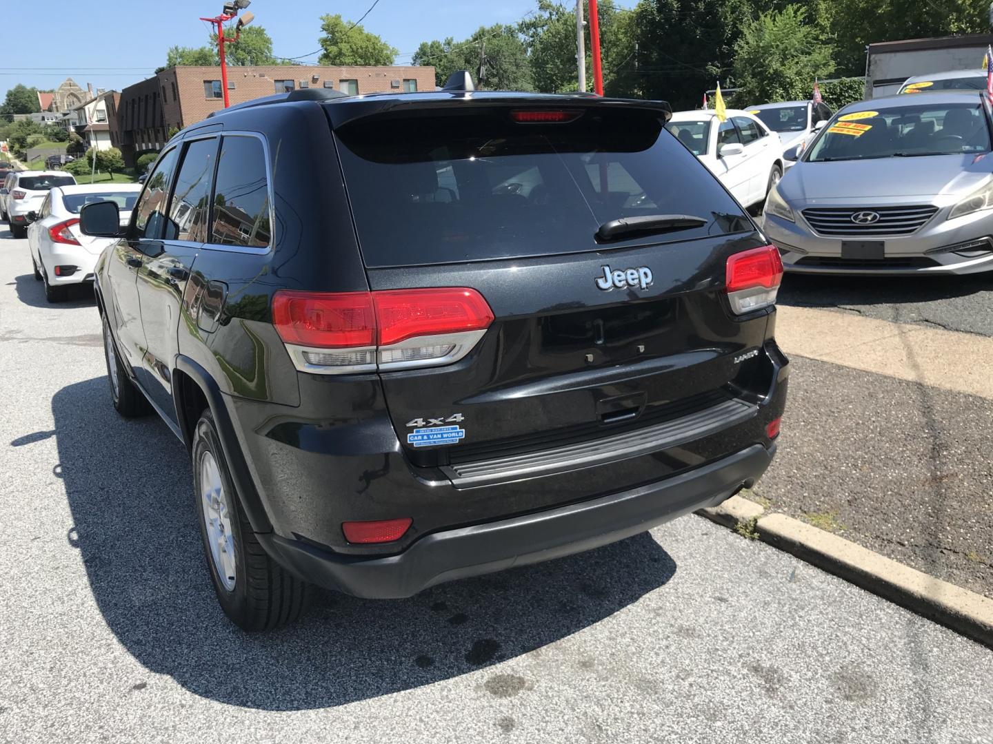 2014 Black /Black Jeep Grand Cherokee Laredo 4WD (1C4RJFAG7EC) with an 3.6L V6 DOHC 24V engine, 5-Speed Automatic transmission, located at 577 Chester Pike, Prospect Park, PA, 19076, (610) 237-1015, 39.886154, -75.302338 - 2014 Jeep Grand Cherokee Laredo 123k miles • New PA Inspection Example Financing: • $3,500 Down • $100 Weekly • $200 Bi-Weekly We finance our own vehicles. We do not obtain or review traditional consumer credit reports. Financing decisions are based on verified income, ability to repay- Photo#5