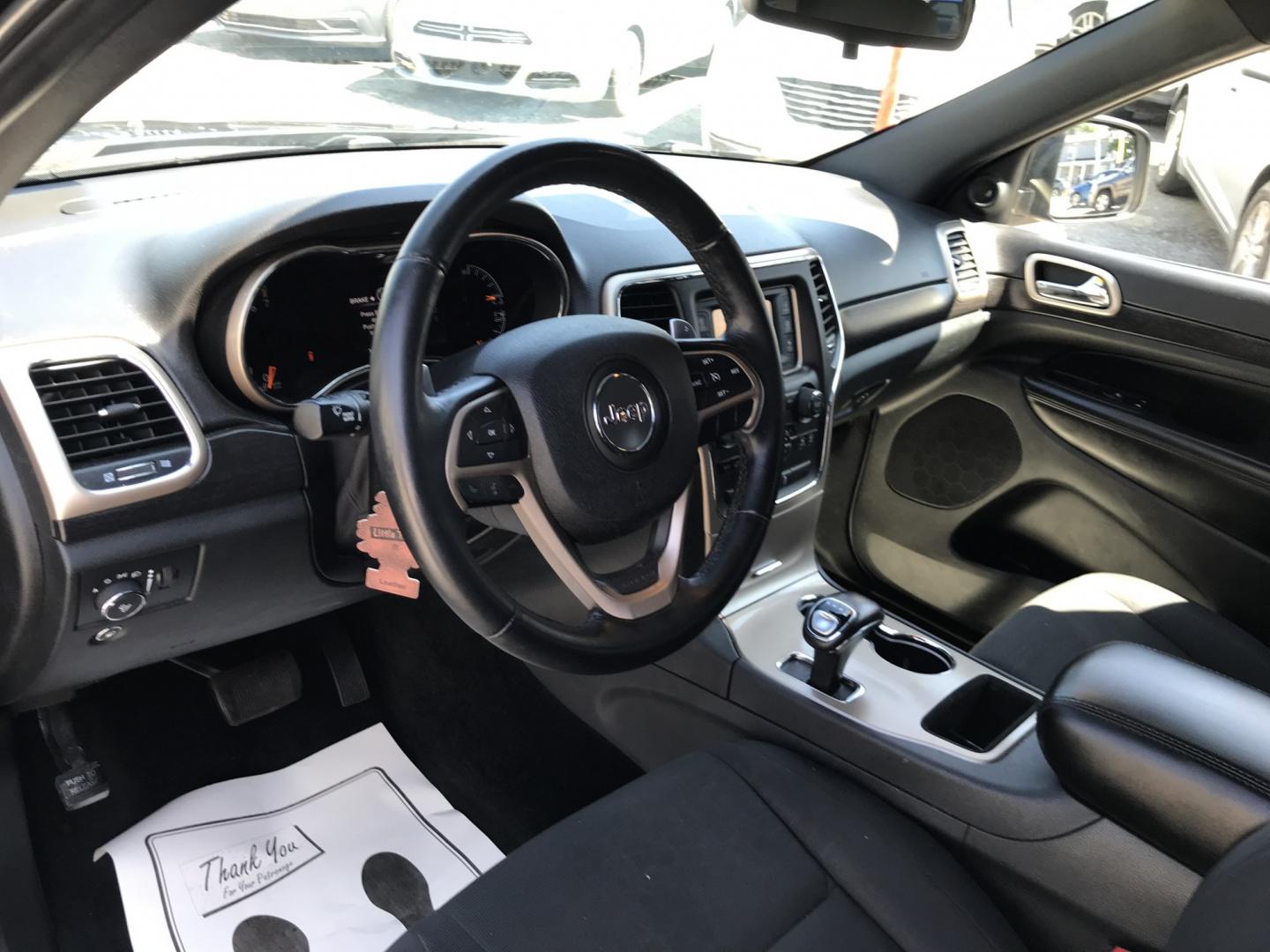 2014 Black /Black Jeep Grand Cherokee Laredo 4WD (1C4RJFAG7EC) with an 3.6L V6 DOHC 24V engine, 5-Speed Automatic transmission, located at 577 Chester Pike, Prospect Park, PA, 19076, (610) 237-1015, 39.886154, -75.302338 - 2014 Jeep Grand Cherokee Laredo 123k miles • New PA Inspection Example Financing: • $3,500 Down • $100 Weekly • $200 Bi-Weekly We finance our own vehicles. We do not obtain or review traditional consumer credit reports. Financing decisions are based on verified income, ability to repay- Photo#10
