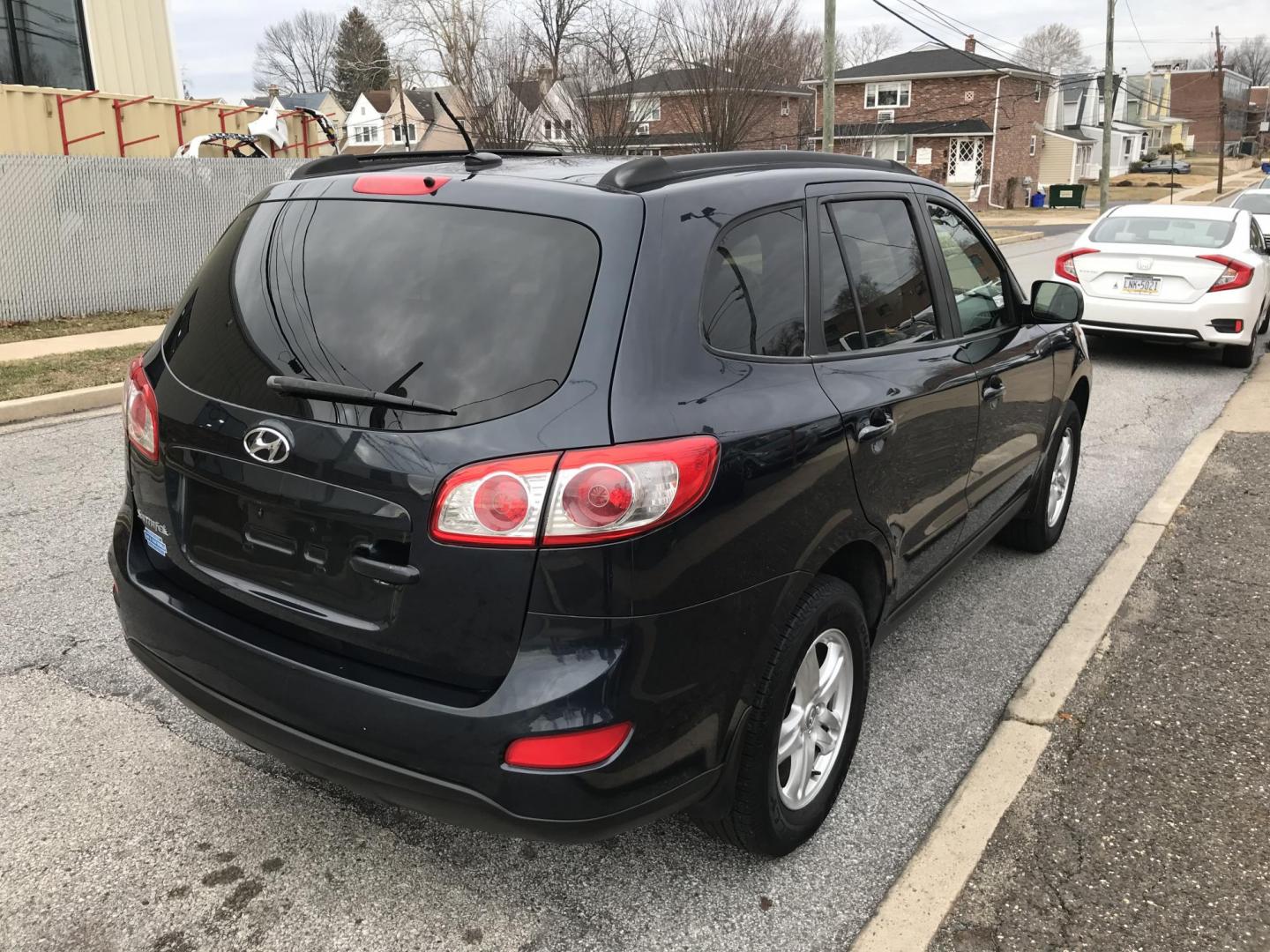 2012 Black /Gray Hyundai Santa Fe GLS 2.4 4WD (5XYZGDAB9CG) with an 2.4L L4 DOHC 16V engine, 6-Speed Automatic transmission, located at 577 Chester Pike, Prospect Park, PA, 19076, (610) 237-1015, 39.886154, -75.302338 - 2012 Hyundai Santa Fe GLS: Only 98k, 4x4, new PA inspection, SUPER CLEAN, runs LIKE NEW! This vehicle comes inspected and has been given a bumper to bumper safety check. It is very clean, reliable, and well maintained. We offer a unique pay plan that is known for being the easiest and fastest fin - Photo#3