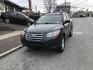 2012 Black /Gray Hyundai Santa Fe GLS 2.4 4WD (5XYZGDAB9CG) with an 2.4L L4 DOHC 16V engine, 6-Speed Automatic transmission, located at 577 Chester Pike, Prospect Park, PA, 19076, (610) 237-1015, 39.886154, -75.302338 - 2012 Hyundai Santa Fe GLS: Only 98k, 4x4, new PA inspection, SUPER CLEAN, runs LIKE NEW! This vehicle comes inspected and has been given a bumper to bumper safety check. It is very clean, reliable, and well maintained. We offer a unique pay plan that is known for being the easiest and fastest fin - Photo#2