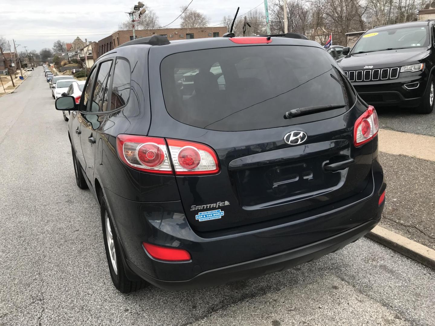 2012 Black /Gray Hyundai Santa Fe GLS 2.4 4WD (5XYZGDAB9CG) with an 2.4L L4 DOHC 16V engine, 6-Speed Automatic transmission, located at 577 Chester Pike, Prospect Park, PA, 19076, (610) 237-1015, 39.886154, -75.302338 - 2012 Hyundai Santa Fe GLS: Only 98k, 4x4, new PA inspection, SUPER CLEAN, runs LIKE NEW! This vehicle comes inspected and has been given a bumper to bumper safety check. It is very clean, reliable, and well maintained. We offer a unique pay plan that is known for being the easiest and fastest fin - Photo#4