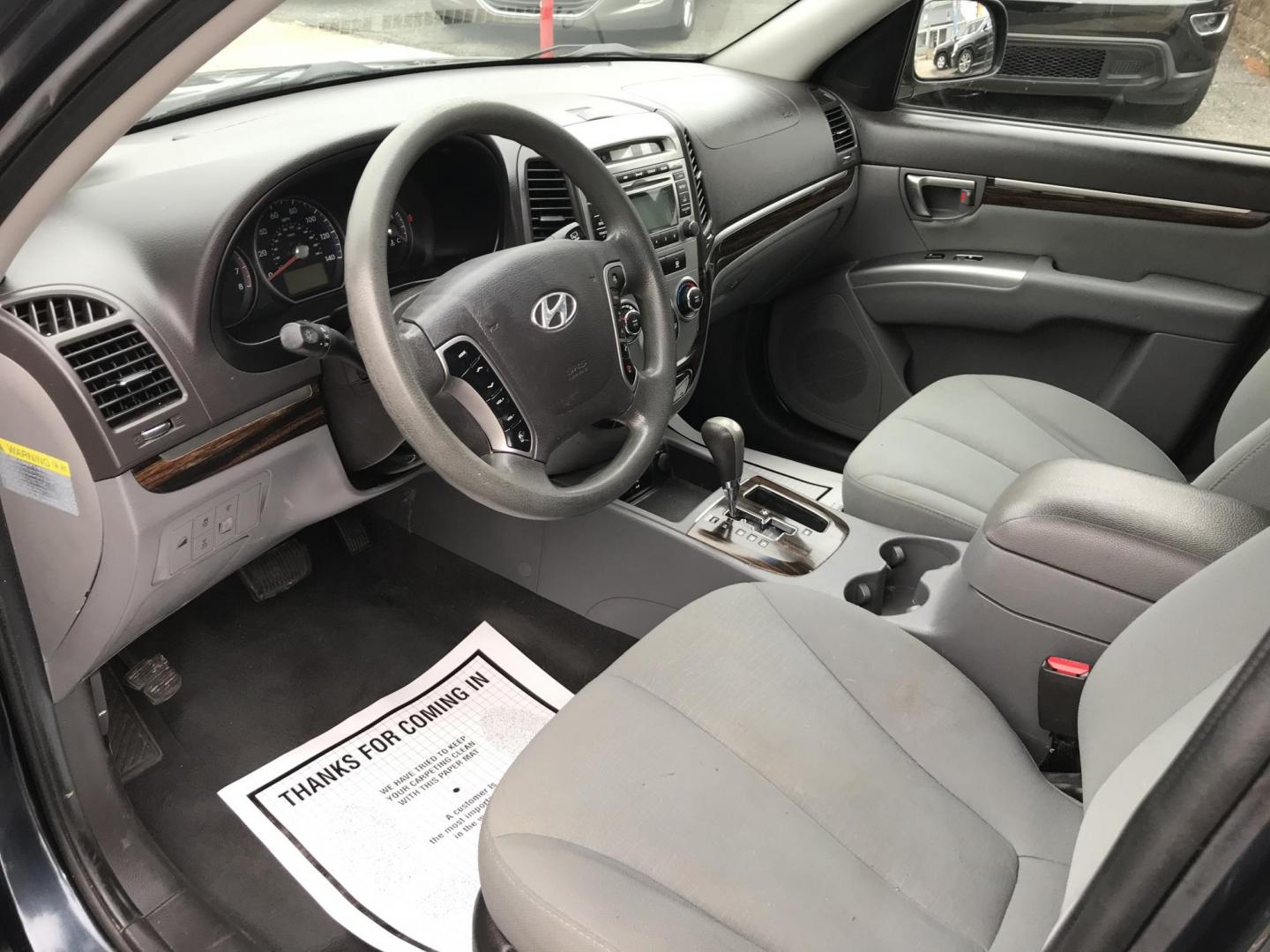 2012 Black /Gray Hyundai Santa Fe GLS 2.4 4WD (5XYZGDAB9CG) with an 2.4L L4 DOHC 16V engine, 6-Speed Automatic transmission, located at 577 Chester Pike, Prospect Park, PA, 19076, (610) 237-1015, 39.886154, -75.302338 - 2012 Hyundai Santa Fe GLS: Only 98k, 4x4, new PA inspection, SUPER CLEAN, runs LIKE NEW! This vehicle comes inspected and has been given a bumper to bumper safety check. It is very clean, reliable, and well maintained. We offer a unique pay plan that is known for being the easiest and fastest fin - Photo#6