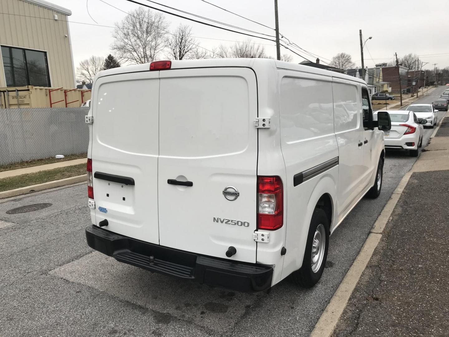 2019 White /Gray Nissan NV Cargo 2500 HD S V6 (1N6BF0KY3KN) with an 4.0L V6 engine, 5A transmission, located at 577 Chester Pike, Prospect Park, PA, 19076, (610) 237-1015, 39.886154, -75.302338 - 2019 Nissan NV 2500 Cargo Van: Has multiple pieces of shelving, backup camera, fleet maintained, partition, SUPER CLEAN, runs LIKE NEW! This vehicle comes inspected and has been given a bumper to bumper safety check. It is very clean, reliable, and well maintained. We offer a unique pay plan that - Photo#4
