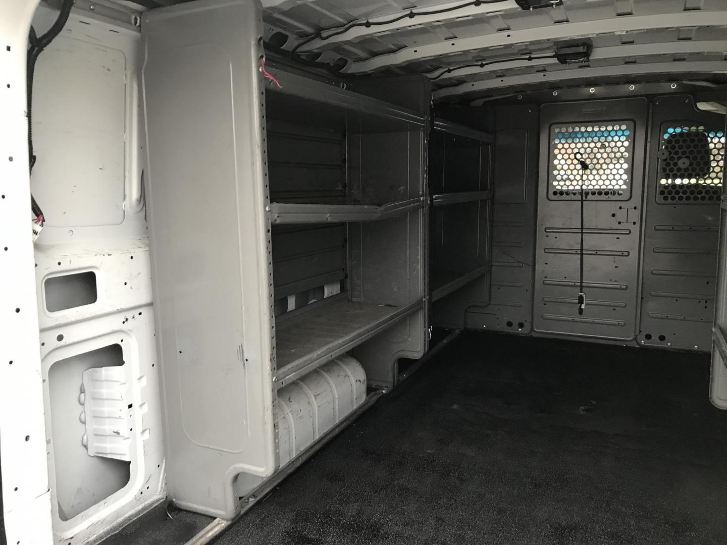 2019 White /Gray Nissan NV Cargo 2500 HD S V6 (1N6BF0KY3KN) with an 4.0L V6 engine, 5A transmission, located at 577 Chester Pike, Prospect Park, PA, 19076, (610) 237-1015, 39.886154, -75.302338 - 2019 Nissan NV 2500 Cargo Van: Has multiple pieces of shelving, backup camera, fleet maintained, partition, SUPER CLEAN, runs LIKE NEW! This vehicle comes inspected and has been given a bumper to bumper safety check. It is very clean, reliable, and well maintained. We offer a unique pay plan that - Photo#14