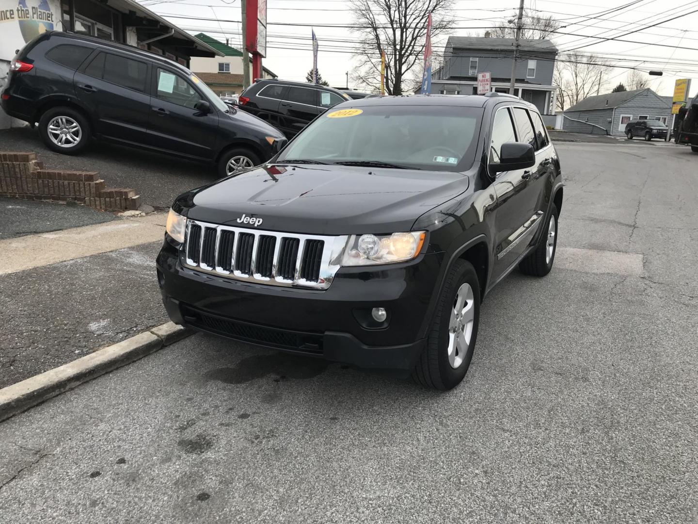 2012 Black /Tan Jeep Grand Cherokee Laredo 4WD (1C4RJFAGXCC) with an 3.6L V6 DOHC 24V engine, 5-Speed Automatic transmission, located at 577 Chester Pike, Prospect Park, PA, 19076, (610) 237-1015, 39.886154, -75.302338 - 2012 Jeep Grand Cherokee Laredo: Only 126k miles, sunroof, backup camera, new PA inspection, SUPER CLEAN, runs LIKE NEW! This vehicle comes inspected and has been given a bumper to bumper safety check. It is very clean, reliable, and well maintained. We offer a unique pay plan that is known for b - Photo#2