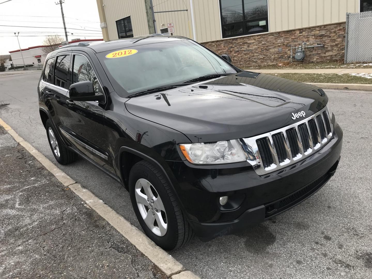 2012 Black /Tan Jeep Grand Cherokee Laredo 4WD (1C4RJFAGXCC) with an 3.6L V6 DOHC 24V engine, 5-Speed Automatic transmission, located at 577 Chester Pike, Prospect Park, PA, 19076, (610) 237-1015, 39.886154, -75.302338 - 2012 Jeep Grand Cherokee Laredo: Only 126k miles, sunroof, backup camera, new PA inspection, SUPER CLEAN, runs LIKE NEW! This vehicle comes inspected and has been given a bumper to bumper safety check. It is very clean, reliable, and well maintained. We offer a unique pay plan that is known for b - Photo#3