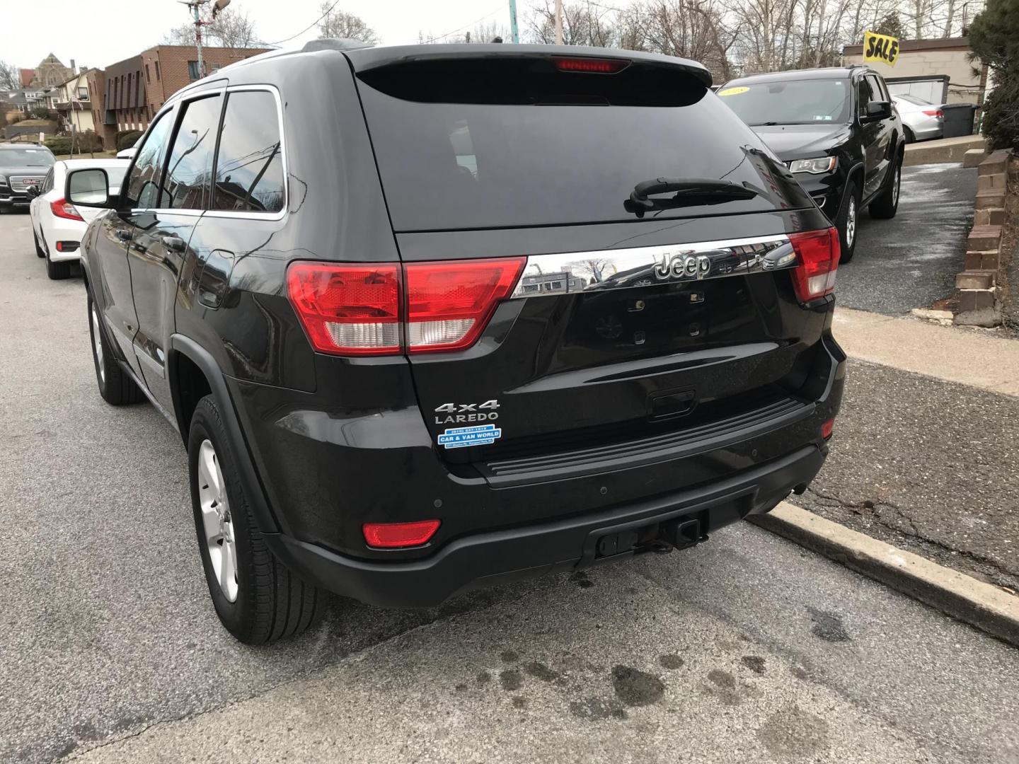 2012 Black /Tan Jeep Grand Cherokee Laredo 4WD (1C4RJFAGXCC) with an 3.6L V6 DOHC 24V engine, 5-Speed Automatic transmission, located at 577 Chester Pike, Prospect Park, PA, 19076, (610) 237-1015, 39.886154, -75.302338 - 2012 Jeep Grand Cherokee Laredo: Only 126k miles, sunroof, backup camera, new PA inspection, SUPER CLEAN, runs LIKE NEW! This vehicle comes inspected and has been given a bumper to bumper safety check. It is very clean, reliable, and well maintained. We offer a unique pay plan that is known for b - Photo#5