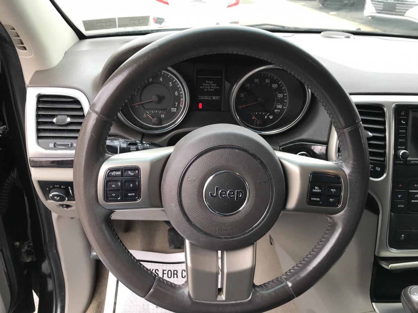 2012 Black /Tan Jeep Grand Cherokee Laredo 4WD (1C4RJFAGXCC) with an 3.6L V6 DOHC 24V engine, 5-Speed Automatic transmission, located at 577 Chester Pike, Prospect Park, PA, 19076, (610) 237-1015, 39.886154, -75.302338 - 2012 Jeep Grand Cherokee Laredo: Only 126k miles, sunroof, backup camera, new PA inspection, SUPER CLEAN, runs LIKE NEW! This vehicle comes inspected and has been given a bumper to bumper safety check. It is very clean, reliable, and well maintained. We offer a unique pay plan that is known for b - Photo#13