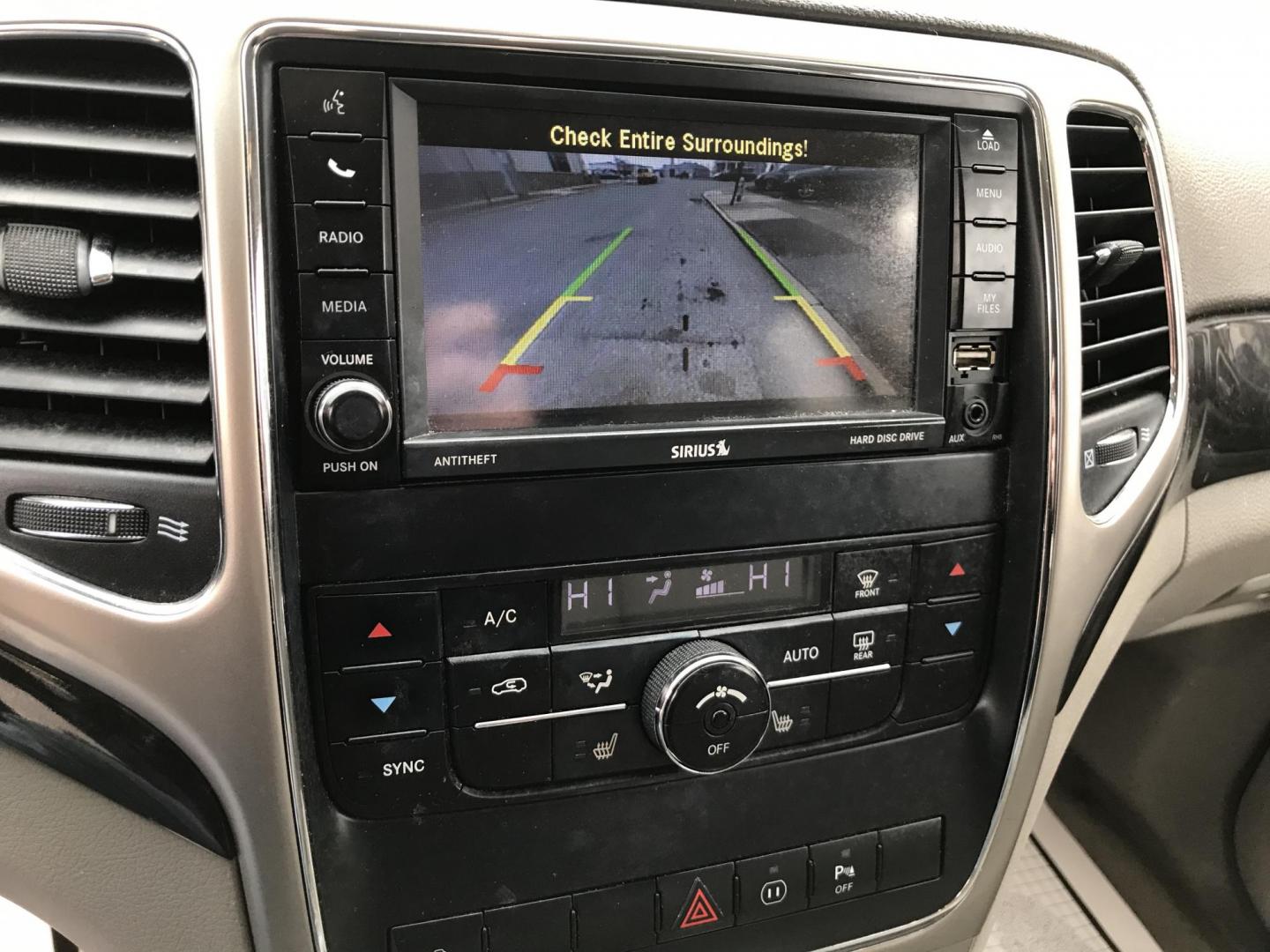 2012 Black /Tan Jeep Grand Cherokee Laredo 4WD (1C4RJFAGXCC) with an 3.6L V6 DOHC 24V engine, 5-Speed Automatic transmission, located at 577 Chester Pike, Prospect Park, PA, 19076, (610) 237-1015, 39.886154, -75.302338 - 2012 Jeep Grand Cherokee Laredo: Only 126k miles, sunroof, backup camera, new PA inspection, SUPER CLEAN, runs LIKE NEW! This vehicle comes inspected and has been given a bumper to bumper safety check. It is very clean, reliable, and well maintained. We offer a unique pay plan that is known for b - Photo#15