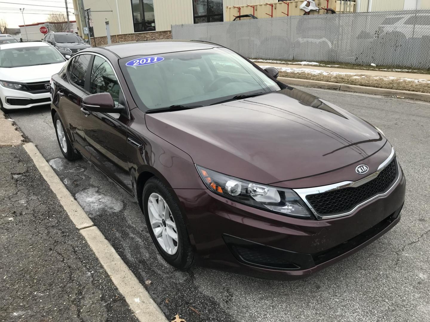 2011 Maroon /Tan Kia Optima EX (KNAGM4A78B5) with an 2.4L L4 DOHC 16V engine, 6-Speed Automatic transmission, located at 577 Chester Pike, Prospect Park, PA, 19076, (610) 237-1015, 39.886154, -75.302338 - 2011 Kia Optima EX: Only 103k miles, new PA inspection, SUPER CLEAN, runs LIKE NEW! This vehicle comes inspected and has been given a bumper to bumper safety check. It is very clean, reliable, and well maintained. We offer a unique pay plan that is known for being the easiest and fastest financin - Photo#3