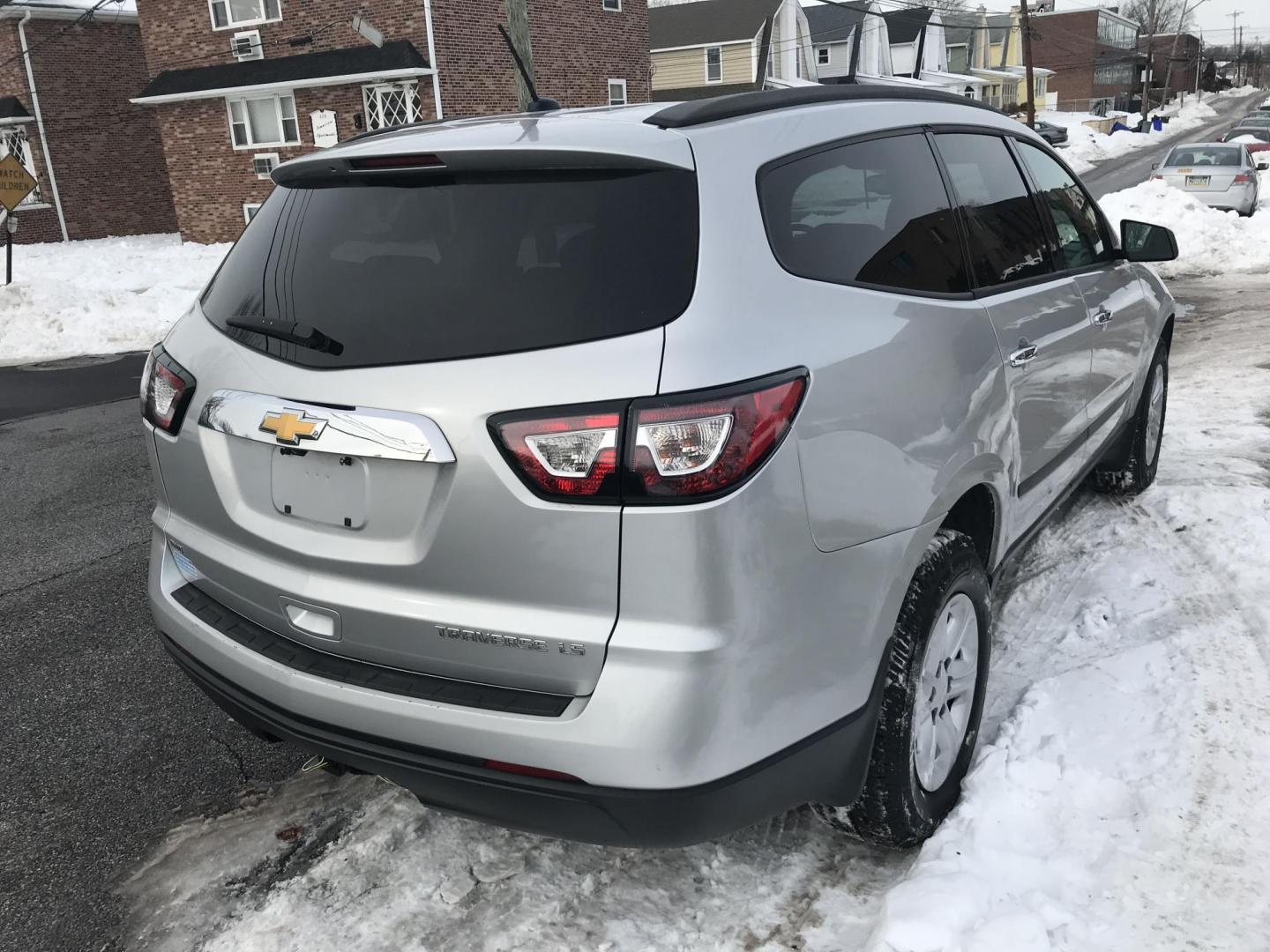 2014 Silver /Gray Chevrolet Traverse LS AWD w/PDC (1GNKVFED5EJ) with an 3.6L V6 DOHC 24V engine, 6-Speed Automatic transmission, located at 577 Chester Pike, Prospect Park, PA, 19076, (610) 237-1015, 39.886154, -75.302338 - 2014 Chevy Traverse: 3rd row seating, AWD, backup camera, new PA inspection, SUPER CLEAN, runs LIKE NEW! This vehicle comes inspected and has been given a bumper to bumper safety check. It is very clean, reliable, and well maintained. We offer a unique pay plan that is known for being the easiest - Photo#4