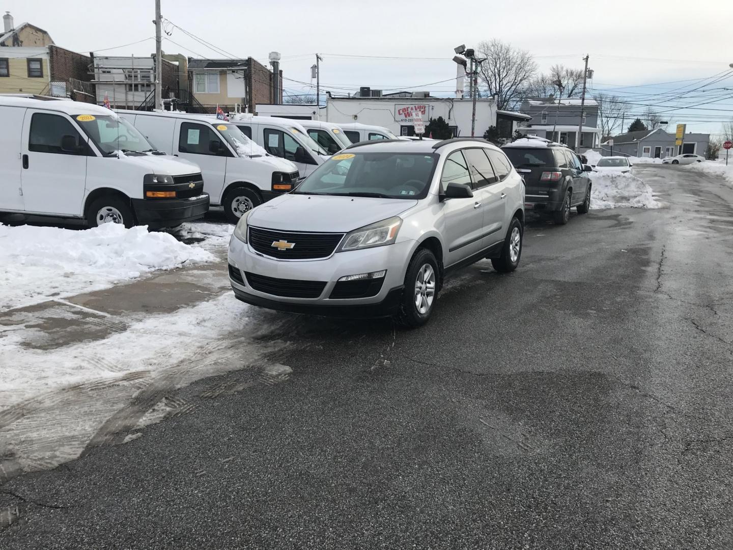 2014 Silver /Gray Chevrolet Traverse LS AWD w/PDC (1GNKVFED5EJ) with an 3.6L V6 DOHC 24V engine, 6-Speed Automatic transmission, located at 577 Chester Pike, Prospect Park, PA, 19076, (610) 237-1015, 39.886154, -75.302338 - 2014 Chevy Traverse: 3rd row seating, AWD, backup camera, new PA inspection, SUPER CLEAN, runs LIKE NEW! This vehicle comes inspected and has been given a bumper to bumper safety check. It is very clean, reliable, and well maintained. We offer a unique pay plan that is known for being the easiest - Photo#1