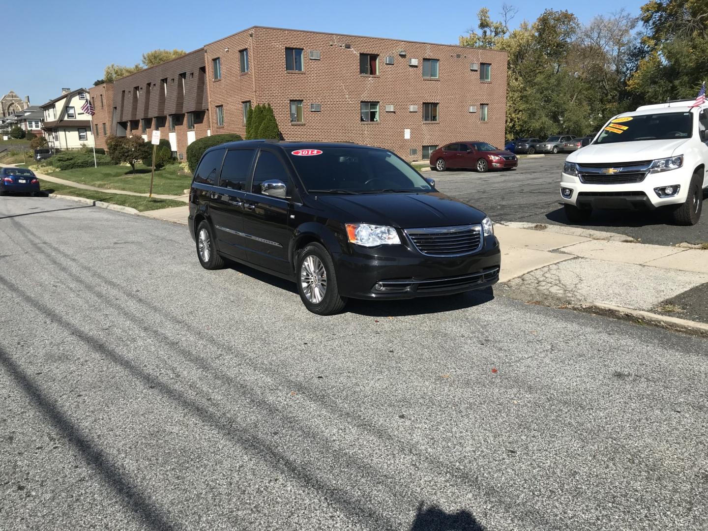 2014 Black /Black Chrysler Town & Country Touring-L (2C4RC1CG6ER) with an 3.6L V6 DOHC 24V engine, 6-Speed Automatic transmission, located at 577 Chester Pike, Prospect Park, PA, 19076, (610) 237-1015, 39.886154, -75.302338 - 2014 Chrysler Town & Country Touring L: DVD player, screen radio, backup camera, stow & go seating, new PA inspection, SUPER CLEAN, runs LIKE NEW! This vehicle comes inspected and has been given a bumper to bumper safety check. It is very clean, reliable, and well maintained. We offer a unique pa- Photo#1