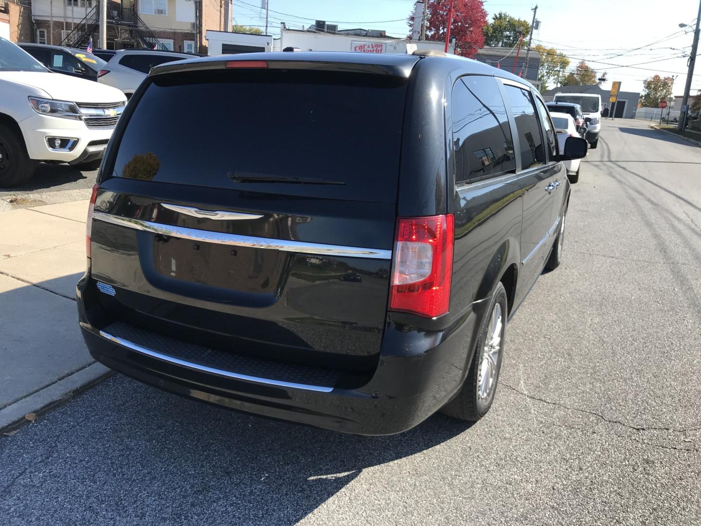 2014 Black /Black Chrysler Town & Country Touring-L (2C4RC1CG6ER) with an 3.6L V6 DOHC 24V engine, 6-Speed Automatic transmission, located at 577 Chester Pike, Prospect Park, PA, 19076, (610) 237-1015, 39.886154, -75.302338 - 2014 Chrysler Town & Country Touring L: DVD player, screen radio, backup camera, stow & go seating, new PA inspection, SUPER CLEAN, runs LIKE NEW! This vehicle comes inspected and has been given a bumper to bumper safety check. It is very clean, reliable, and well maintained. We offer a unique pa- Photo#7