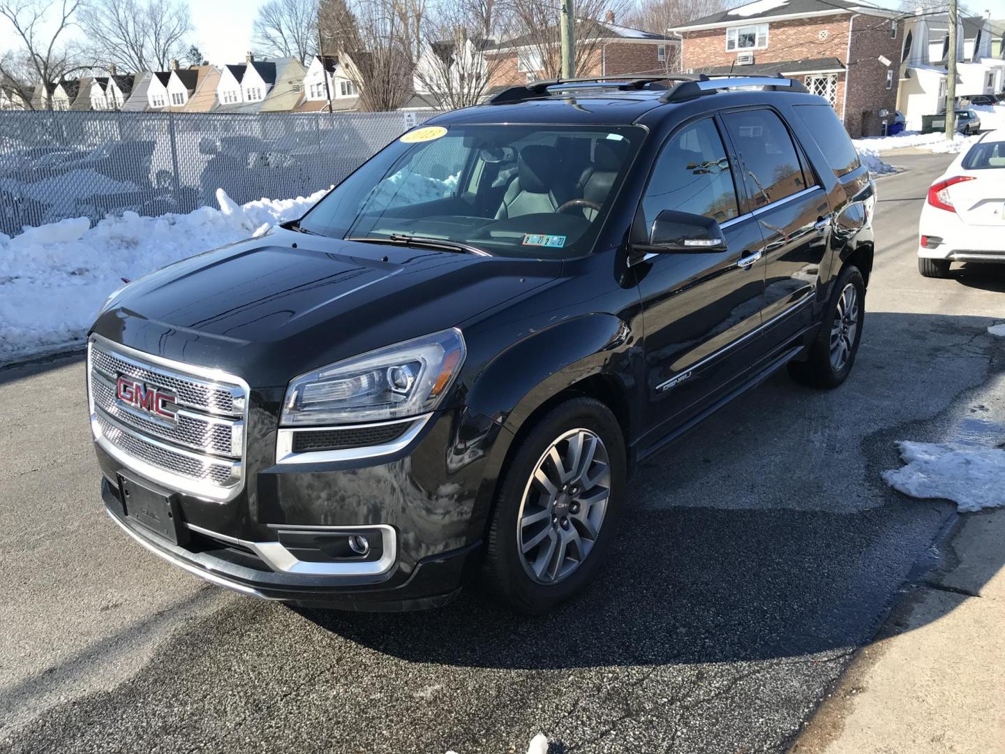 2013 Black /Black GMC Acadia Denali AWD (1GKKVTKD4DJ) with an 3.6L V6 DOHC 24V engine, 6-Speed Automatic transmission, located at 577 Chester Pike, Prospect Park, PA, 19076, (610) 237-1015, 39.886154, -75.302338 - 2013 GMC Acadia Denali AWD: 3rd row seating, backup camera, AWD, 2 sunroofs, new inspection, SUPER CLEAN, runs LIKE NEW! This vehicle comes inspected and has been given a bumper to bumper safety check. It is very clean, reliable, and well maintained. We offer a unique pay plan that is known for b - Photo#3