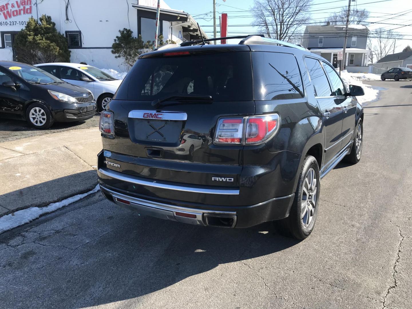 2013 Black /Black GMC Acadia Denali AWD (1GKKVTKD4DJ) with an 3.6L V6 DOHC 24V engine, 6-Speed Automatic transmission, located at 577 Chester Pike, Prospect Park, PA, 19076, (610) 237-1015, 39.886154, -75.302338 - 2013 GMC Acadia Denali AWD: 3rd row seating, backup camera, AWD, 2 sunroofs, new inspection, SUPER CLEAN, runs LIKE NEW! This vehicle comes inspected and has been given a bumper to bumper safety check. It is very clean, reliable, and well maintained. We offer a unique pay plan that is known for b - Photo#7