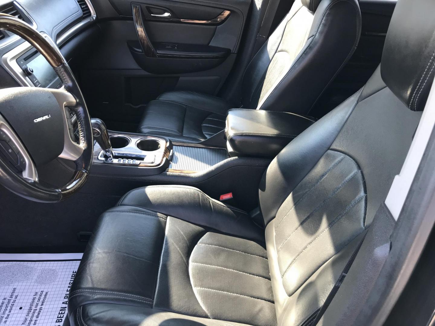 2013 Black /Black GMC Acadia Denali AWD (1GKKVTKD4DJ) with an 3.6L V6 DOHC 24V engine, 6-Speed Automatic transmission, located at 577 Chester Pike, Prospect Park, PA, 19076, (610) 237-1015, 39.886154, -75.302338 - 2013 GMC Acadia Denali AWD: 3rd row seating, backup camera, AWD, 2 sunroofs, new inspection, SUPER CLEAN, runs LIKE NEW! This vehicle comes inspected and has been given a bumper to bumper safety check. It is very clean, reliable, and well maintained. We offer a unique pay plan that is known for b - Photo#10