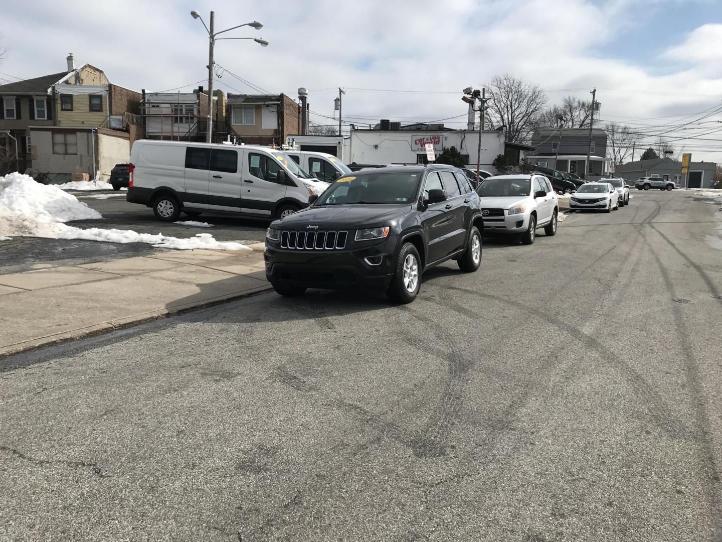 2014 Black /Black Jeep Grand Cherokee Laredo 4WD (1C4RJFAG6EC) with an 3.6L V6 DOHC 24V engine, 5-Speed Automatic transmission, located at 577 Chester Pike, Prospect Park, PA, 19076, (610) 237-1015, 39.886154, -75.302338 - 2014 Jeep Grand Cherokee Laredo: Sunroof, 4x4, backup camera, new PA inspection, SUPER CLEAN, runs LIKE NEW! This vehicle comes inspected and has been given a bumper to bumper safety check. It is very clean, reliable, and well maintained. We offer a unique pay plan that is known for being the eas - Photo#1