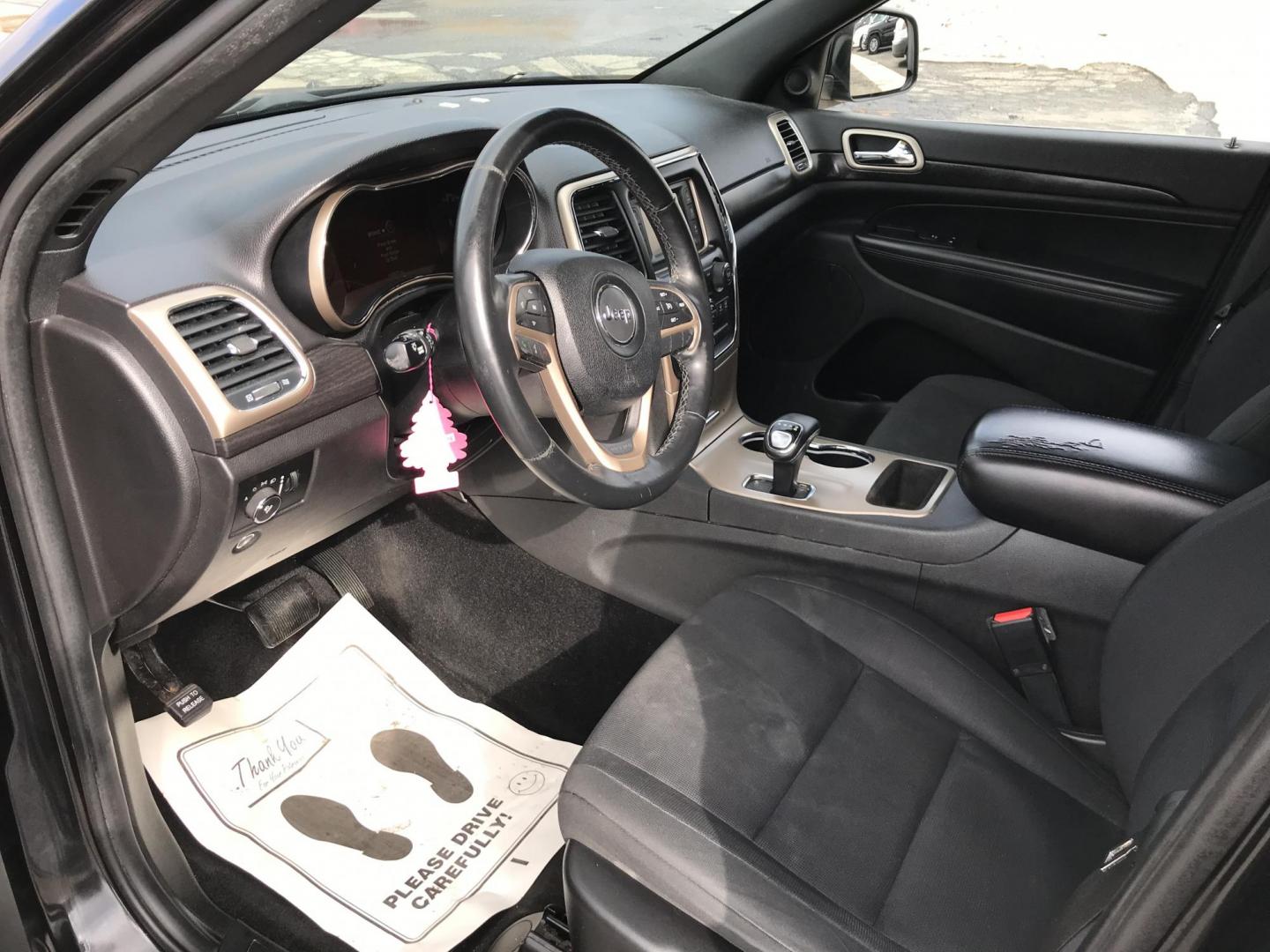 2014 Black /Black Jeep Grand Cherokee Laredo 4WD (1C4RJFAG6EC) with an 3.6L V6 DOHC 24V engine, 5-Speed Automatic transmission, located at 577 Chester Pike, Prospect Park, PA, 19076, (610) 237-1015, 39.886154, -75.302338 - 2014 Jeep Grand Cherokee Laredo: Sunroof, 4x4, backup camera, new PA inspection, SUPER CLEAN, runs LIKE NEW! This vehicle comes inspected and has been given a bumper to bumper safety check. It is very clean, reliable, and well maintained. We offer a unique pay plan that is known for being the eas - Photo#7