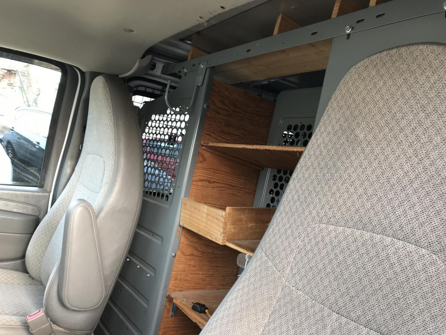 2015 White GMC Savana G2500 Cargo (1GTW7FCF8F1) with an 4.8L V8 FFV engine, 6-Speed Automatic transmission, located at 577 Chester Pike, Prospect Park, PA, 19076, (610) 237-1015, 39.886154, -75.302338 - 2015 GMC Savana 2500 Cargo Van: Has multiple pieces of shelving, partition, cages over windows, power locks and windows, new PA inspection, FLEET MAINTAINED! This vehicle comes inspected and has been given a bumper to bumper safety check. It is very clean, reliable, and well maintained. We offer - Photo#10