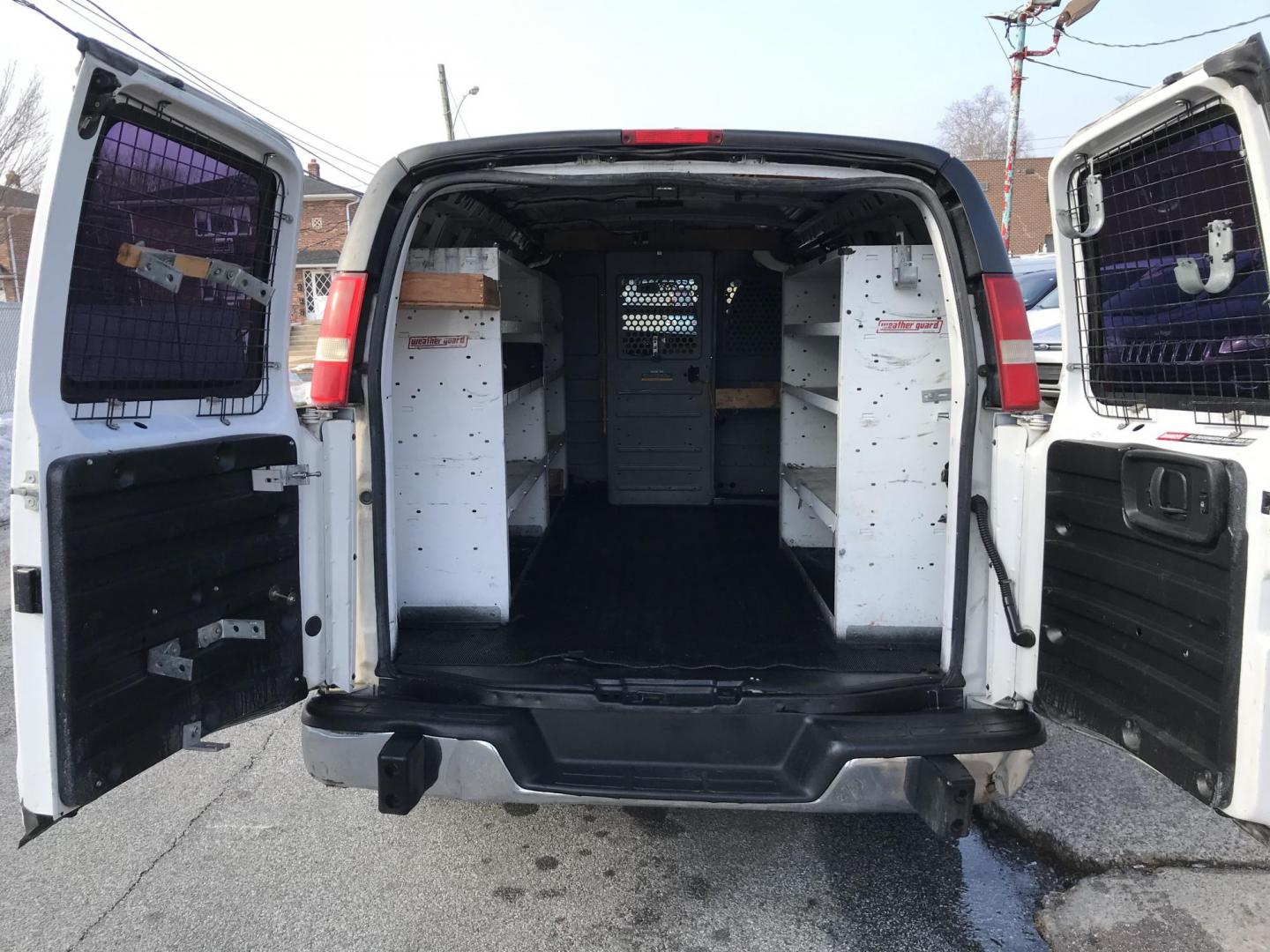 2015 White GMC Savana G2500 Cargo (1GTW7FCF8F1) with an 4.8L V8 FFV engine, 6-Speed Automatic transmission, located at 577 Chester Pike, Prospect Park, PA, 19076, (610) 237-1015, 39.886154, -75.302338 - 2015 GMC Savana 2500 Cargo Van: Has multiple pieces of shelving, partition, cages over windows, power locks and windows, new PA inspection, FLEET MAINTAINED! This vehicle comes inspected and has been given a bumper to bumper safety check. It is very clean, reliable, and well maintained. We offer - Photo#14
