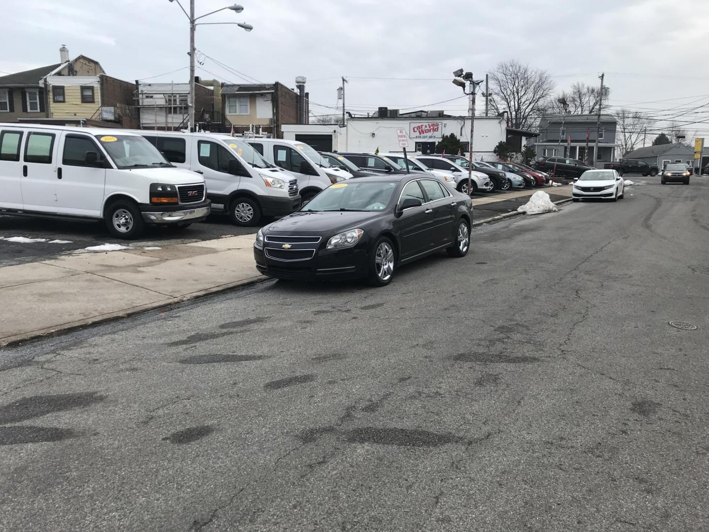2012 Black /Gray Chevrolet Malibu 1LT (1G1ZC5E0XCF) with an 2.4L L4 DOHC 16V engine, 6-Speed Automatic transmission, located at 577 Chester Pike, Prospect Park, PA, 19076, (610) 237-1015, 39.886154, -75.302338 - Photo#1