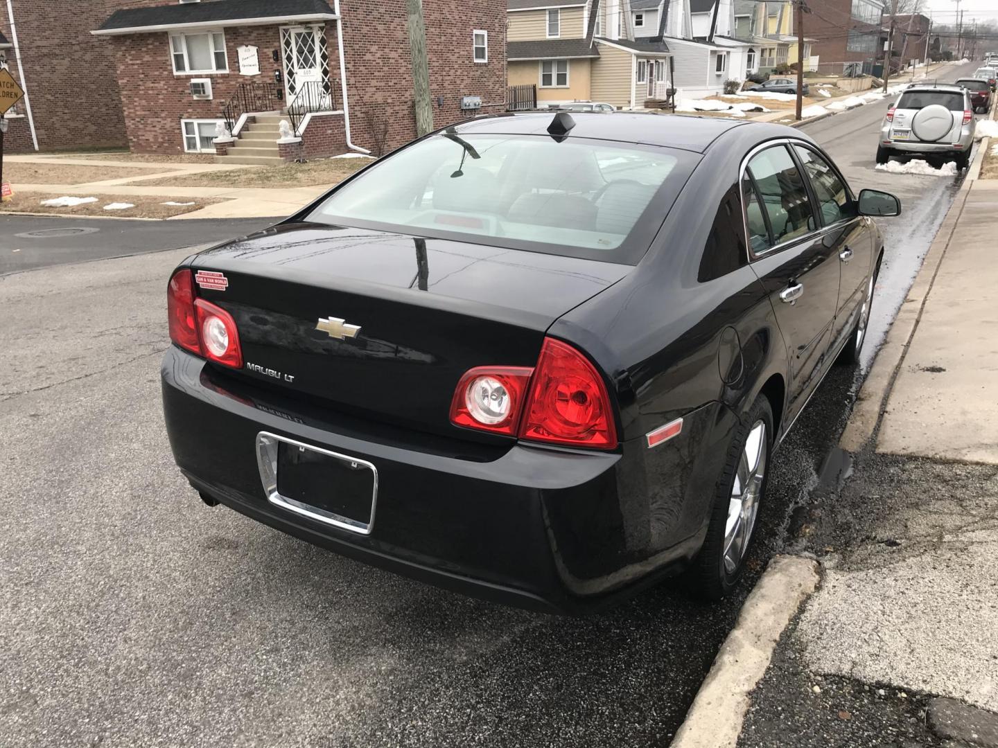 2012 Black /Gray Chevrolet Malibu 1LT (1G1ZC5E0XCF) with an 2.4L L4 DOHC 16V engine, 6-Speed Automatic transmission, located at 577 Chester Pike, Prospect Park, PA, 19076, (610) 237-1015, 39.886154, -75.302338 - Photo#4