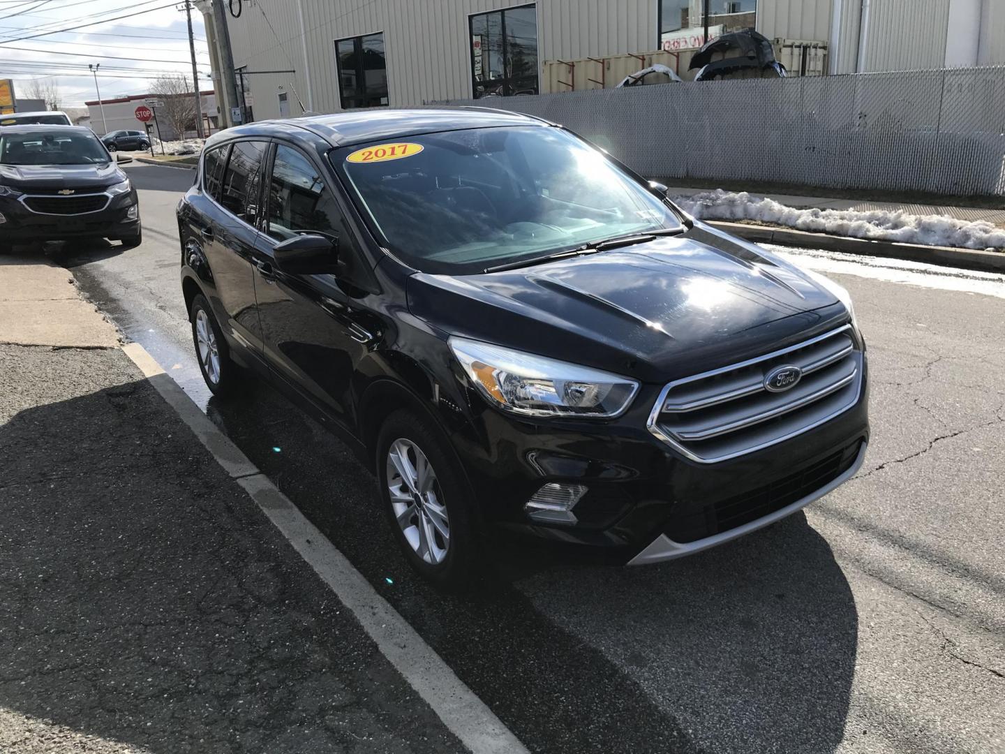 2017 Black /Black Ford Escape SE 4WD (1FMCU9G91HU) with an 2.0L L4 DOHC 16V engine, 6A transmission, located at 577 Chester Pike, Prospect Park, PA, 19076, (610) 237-1015, 39.886154, -75.302338 - 2017 Ford Escape SE: Only 120k miles, 4x4, backup camera, SUPER CLEAN, runs LIKE NEW! This vehicle comes inspected and has been given a bumper to bumper safety check. It is very clean, reliable, and well maintained. We offer a unique pay plan that is known for being the easiest and fastest financ - Photo#3