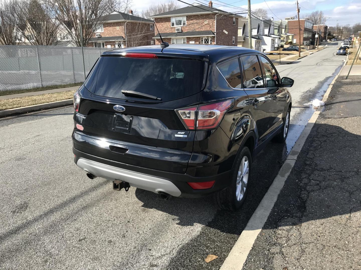 2017 Black /Black Ford Escape SE 4WD (1FMCU9G91HU) with an 2.0L L4 DOHC 16V engine, 6A transmission, located at 577 Chester Pike, Prospect Park, PA, 19076, (610) 237-1015, 39.886154, -75.302338 - 2017 Ford Escape SE: Only 120k miles, 4x4, backup camera, SUPER CLEAN, runs LIKE NEW! This vehicle comes inspected and has been given a bumper to bumper safety check. It is very clean, reliable, and well maintained. We offer a unique pay plan that is known for being the easiest and fastest financ - Photo#4