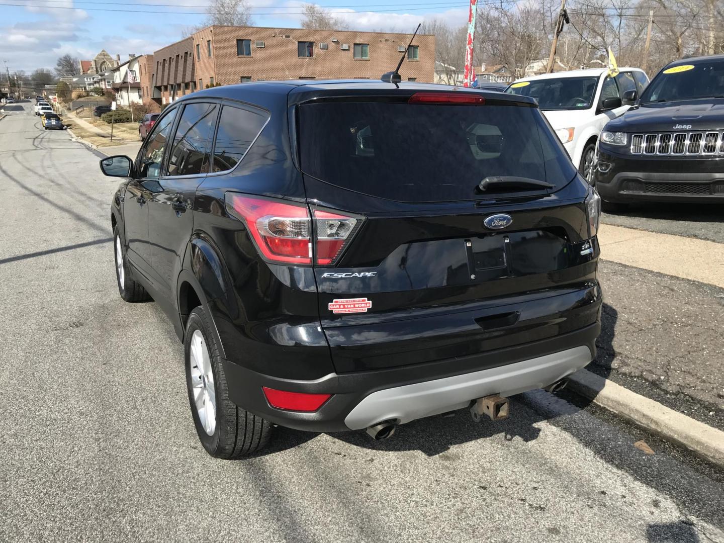 2017 Black /Black Ford Escape SE 4WD (1FMCU9G91HU) with an 2.0L L4 DOHC 16V engine, 6A transmission, located at 577 Chester Pike, Prospect Park, PA, 19076, (610) 237-1015, 39.886154, -75.302338 - 2017 Ford Escape SE: Only 120k miles, 4x4, backup camera, SUPER CLEAN, runs LIKE NEW! This vehicle comes inspected and has been given a bumper to bumper safety check. It is very clean, reliable, and well maintained. We offer a unique pay plan that is known for being the easiest and fastest financ - Photo#5
